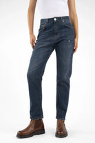Dark blue mid waist boyfriend jeans with relaxed fit and destroyed details for casual style