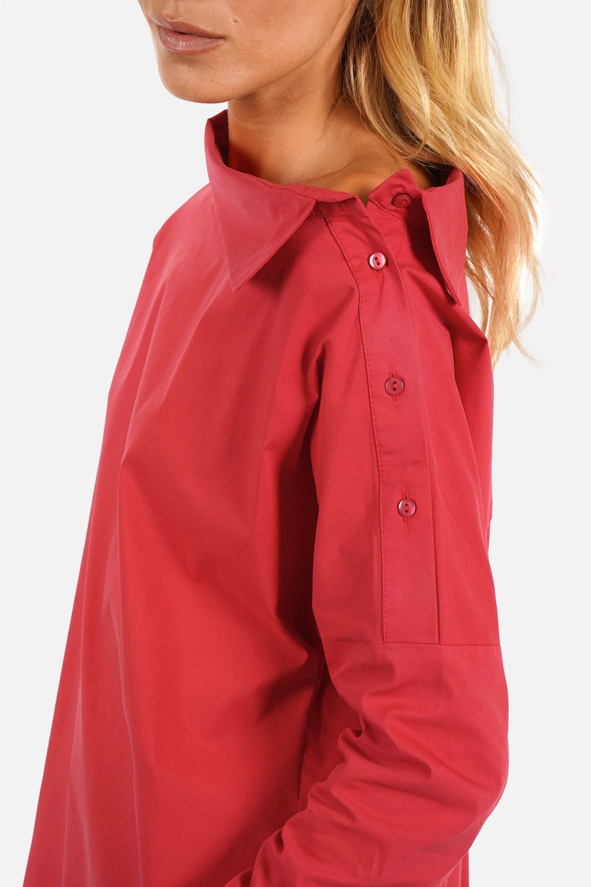 Weiße asymmetrische One Shoulder Bluse aus Baumwollmix mit Knopfleiste und breiten Manschetten