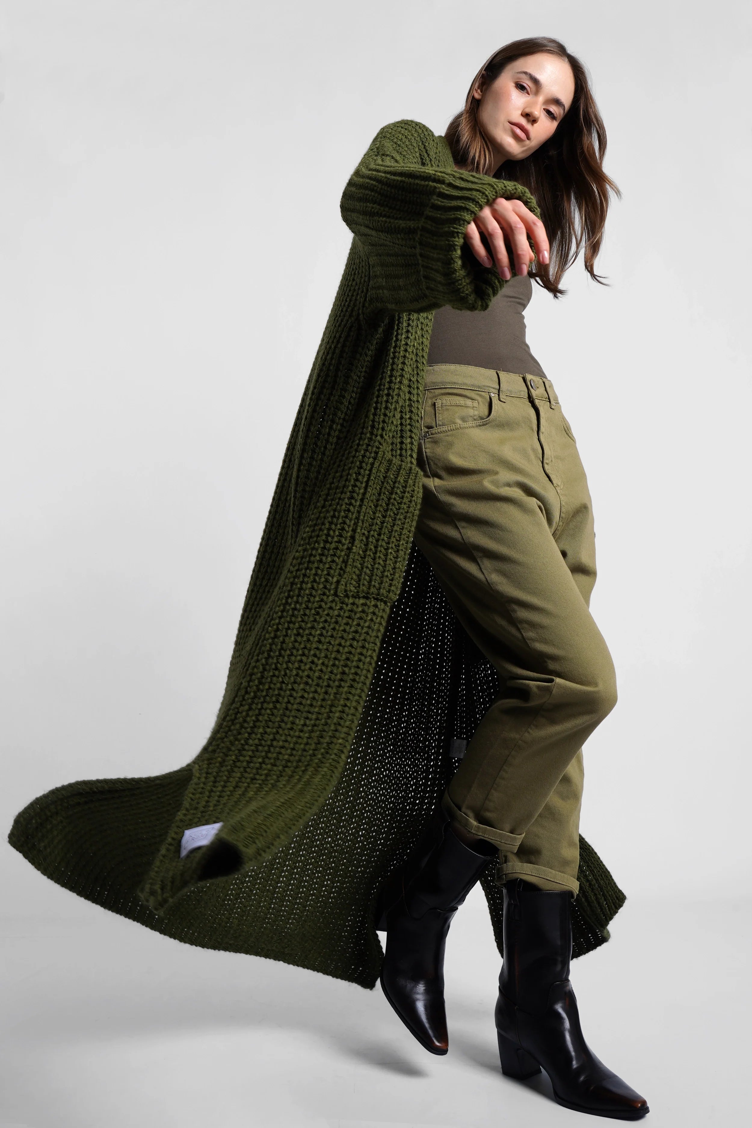 Model wearing olive green LOLA Strickcardigan knit cardigan with oversized relaxed fit and front pockets