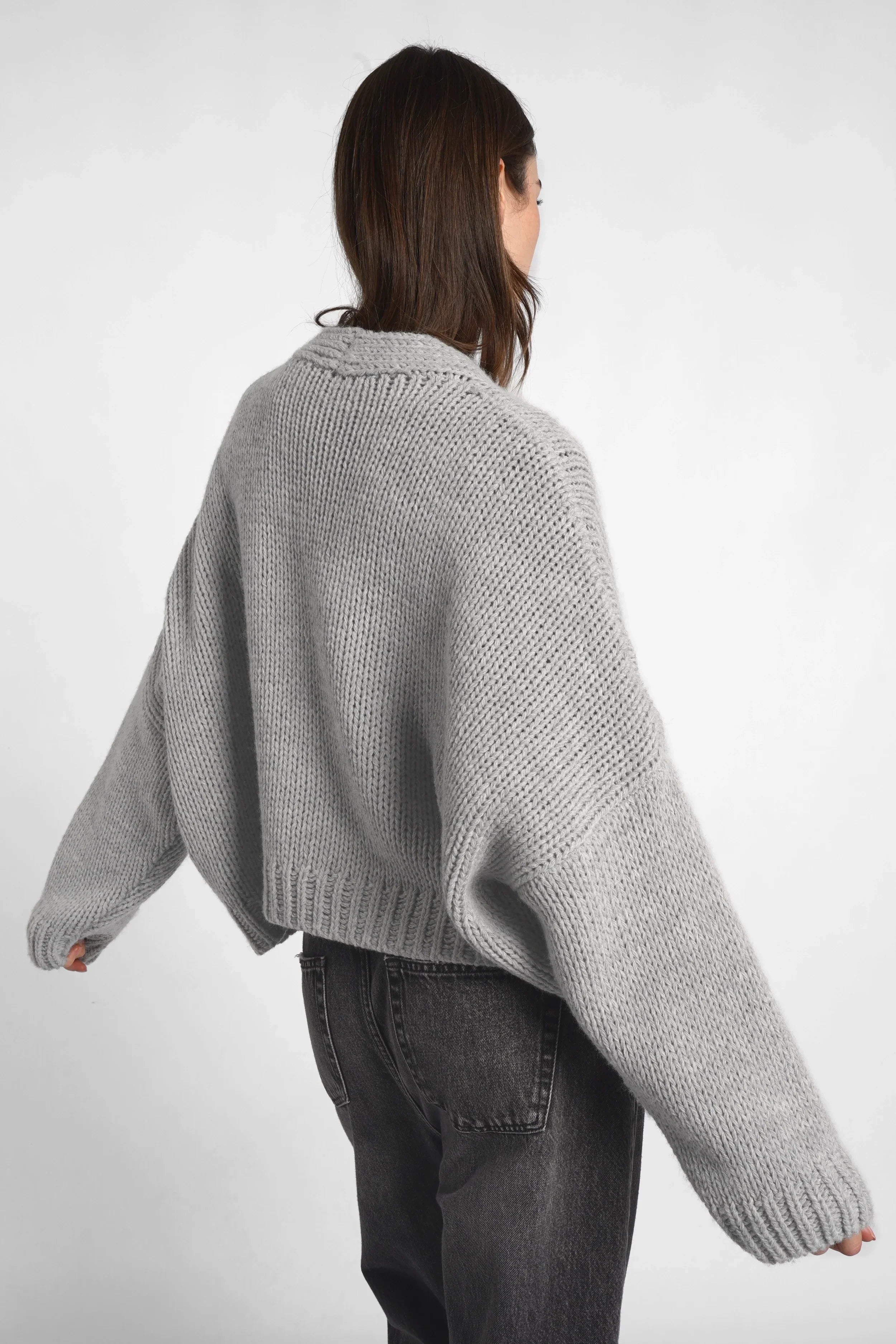 ALIXA Cropped Strickcardigan in grey wool blend with oversized fit and ribbed cuffs shown from back