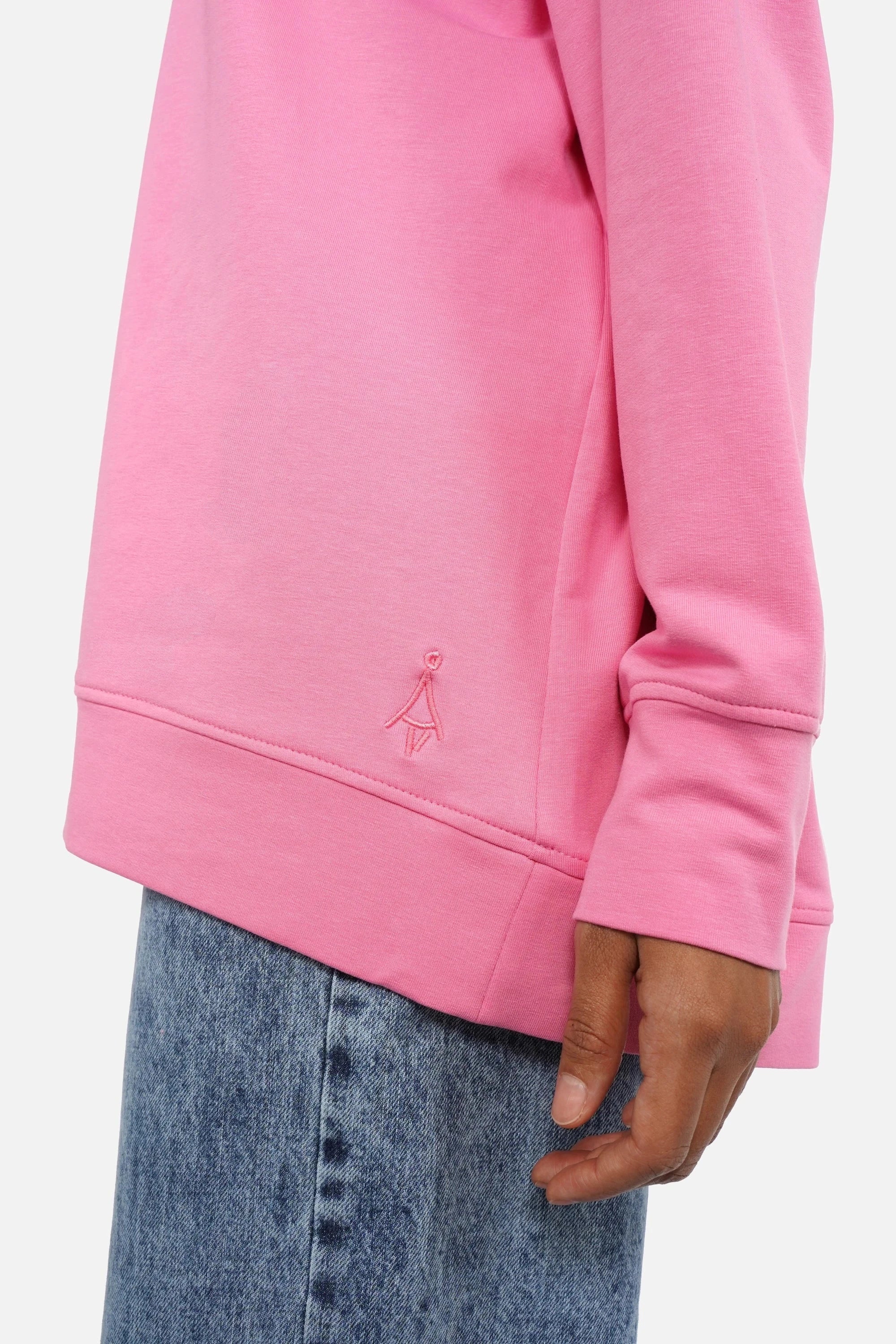 EIREL oversize sweater with soft cotton, round neckline, dropped shoulders, ribbed cuffs, rounded hem, tonal logo embroidery, A-line cut, and oversize fit.