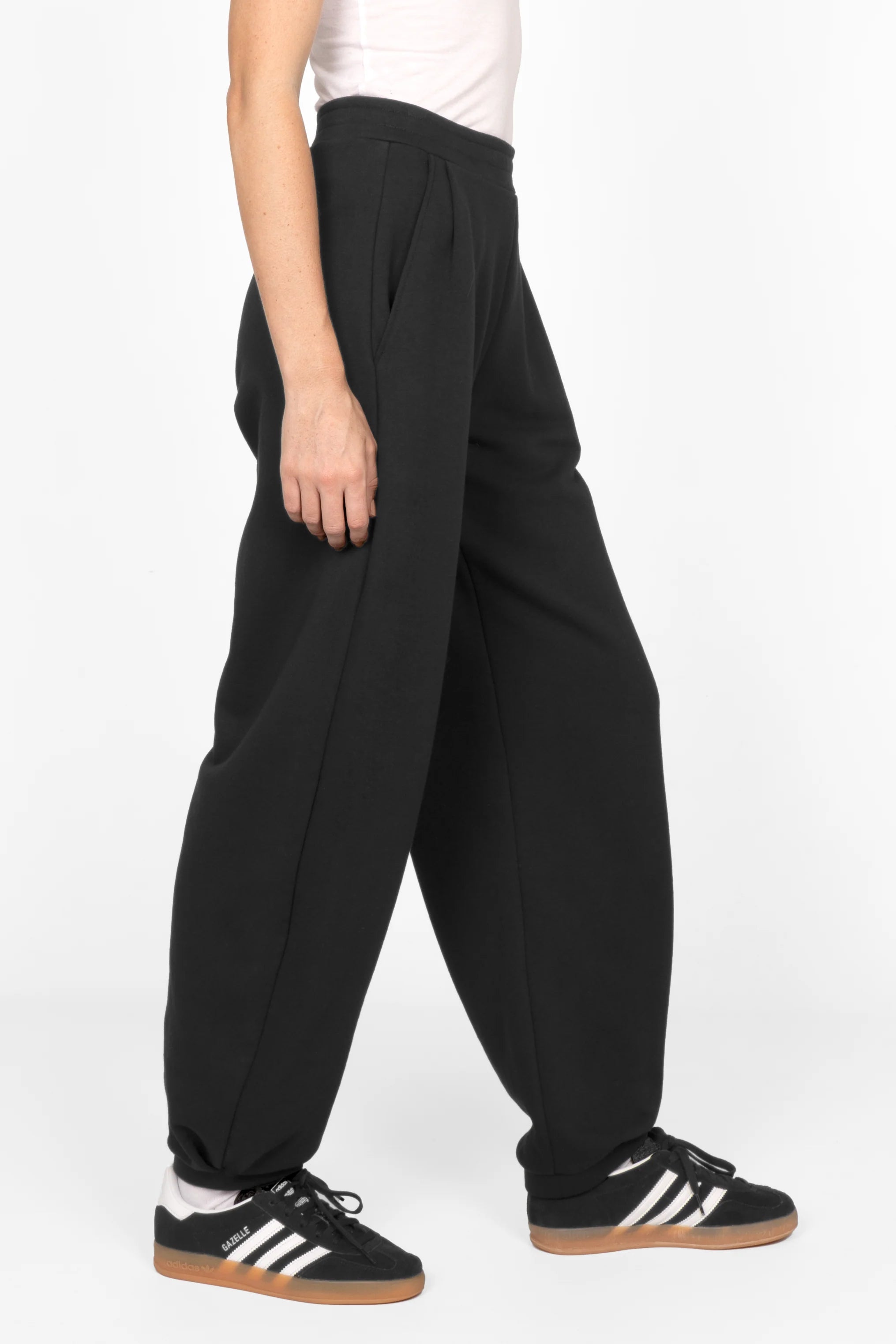 Black ELVEA O-Shape relaxed fit sweatpants with elastic waistband and side pockets