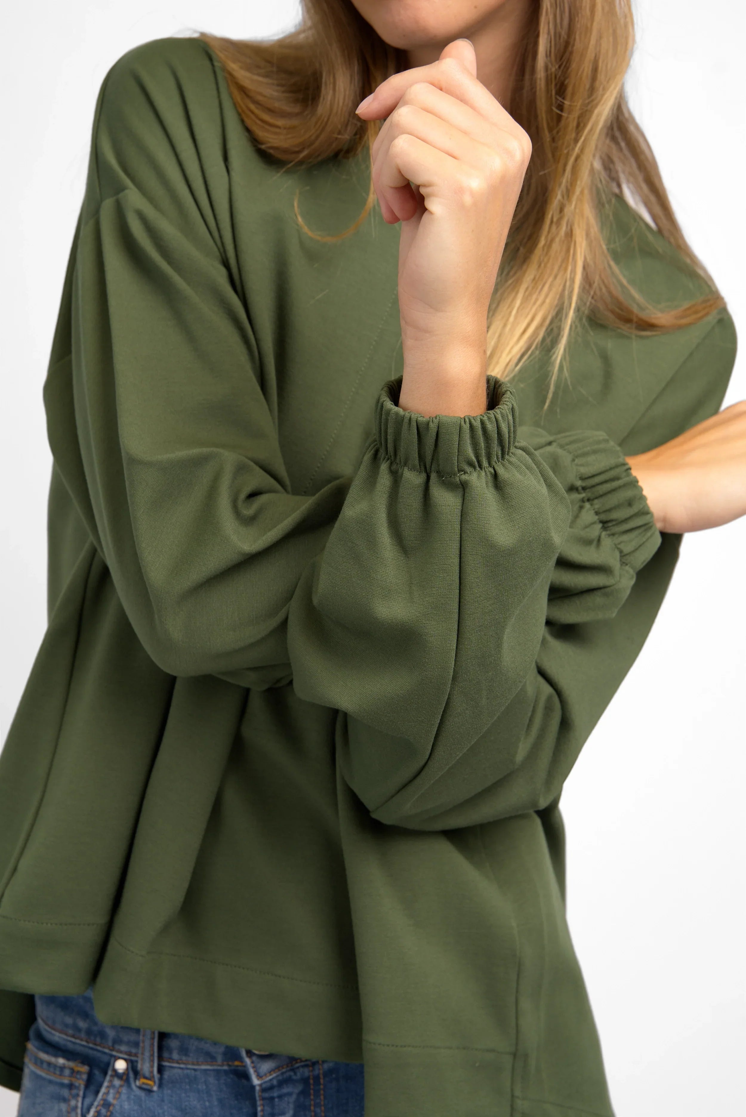 HAGLA Shirt in olive green with relaxed fit, elastic cuffs, round neckline, and soft wrinkle-free viscose blend fabric