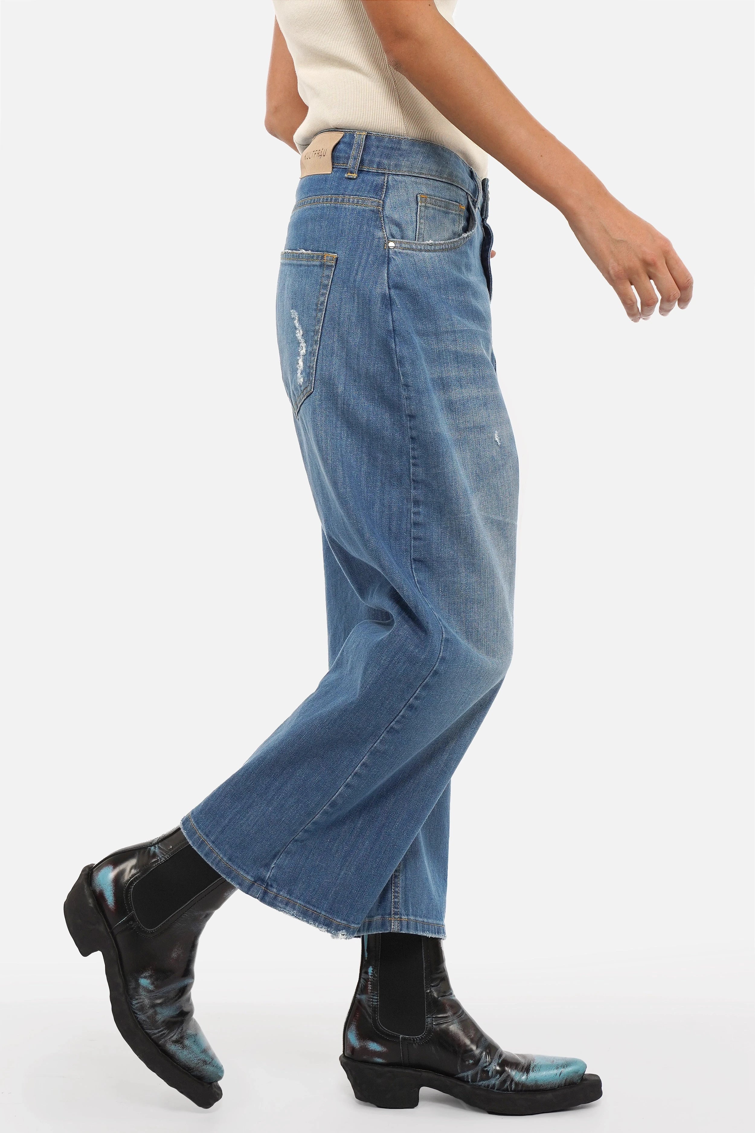 Lightweight Italian denim baggy jeans with destroyed wash and relaxed fit
