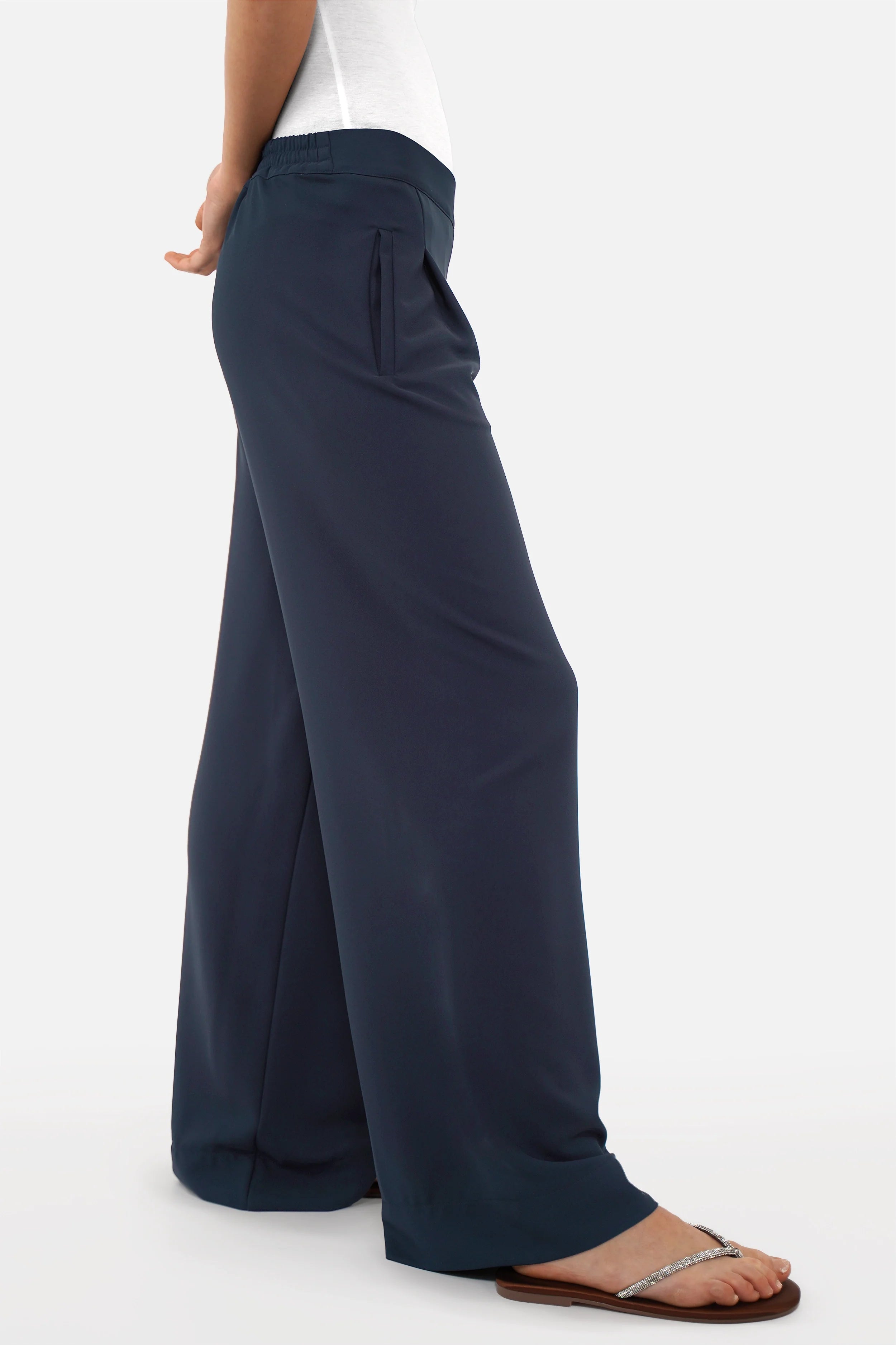 Woman wearing LARA.K Wide Leg Pants with elastic waistband and side pockets in lightweight fabric