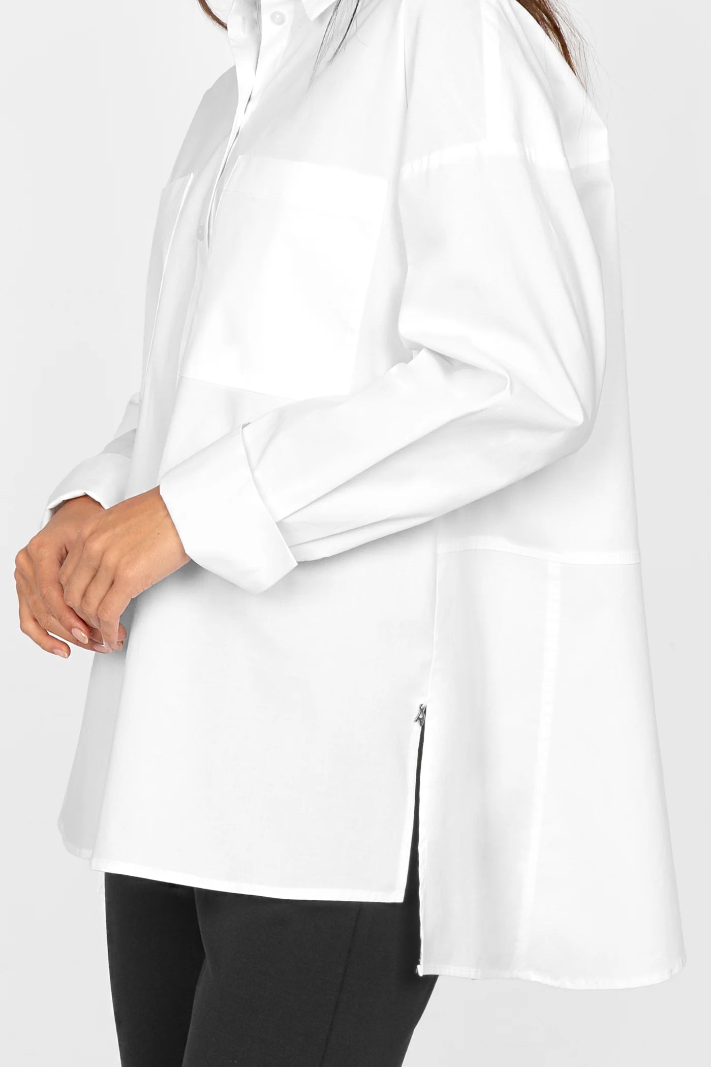 White LEA.K Loose Fit cotton poplin blouse with hem collar, chest pockets, wide cuffs, and extended back with side slits