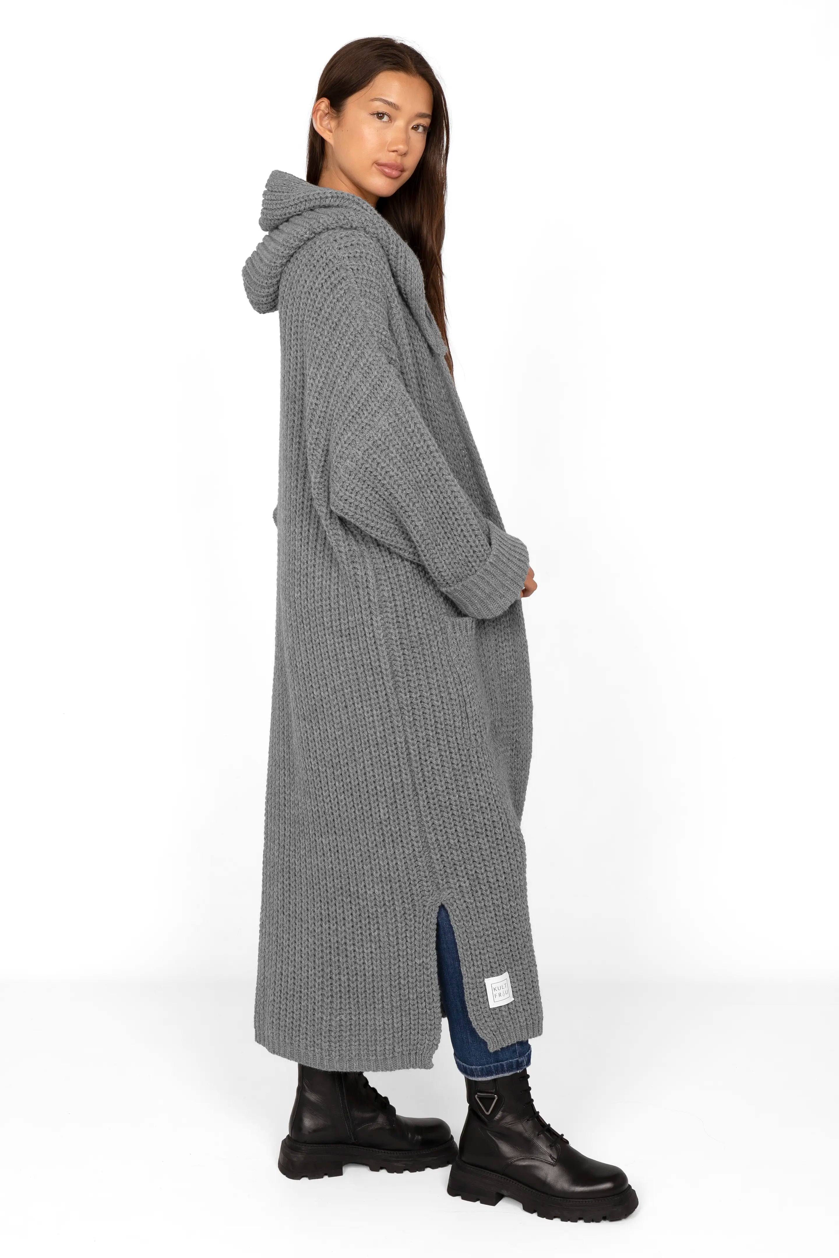 LOVITA long gray knitted cardigan with hood and oversized fit worn by model