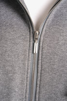 Close-up of grey Longzip-Hoodie with two-way zipper and soft cotton fabric
