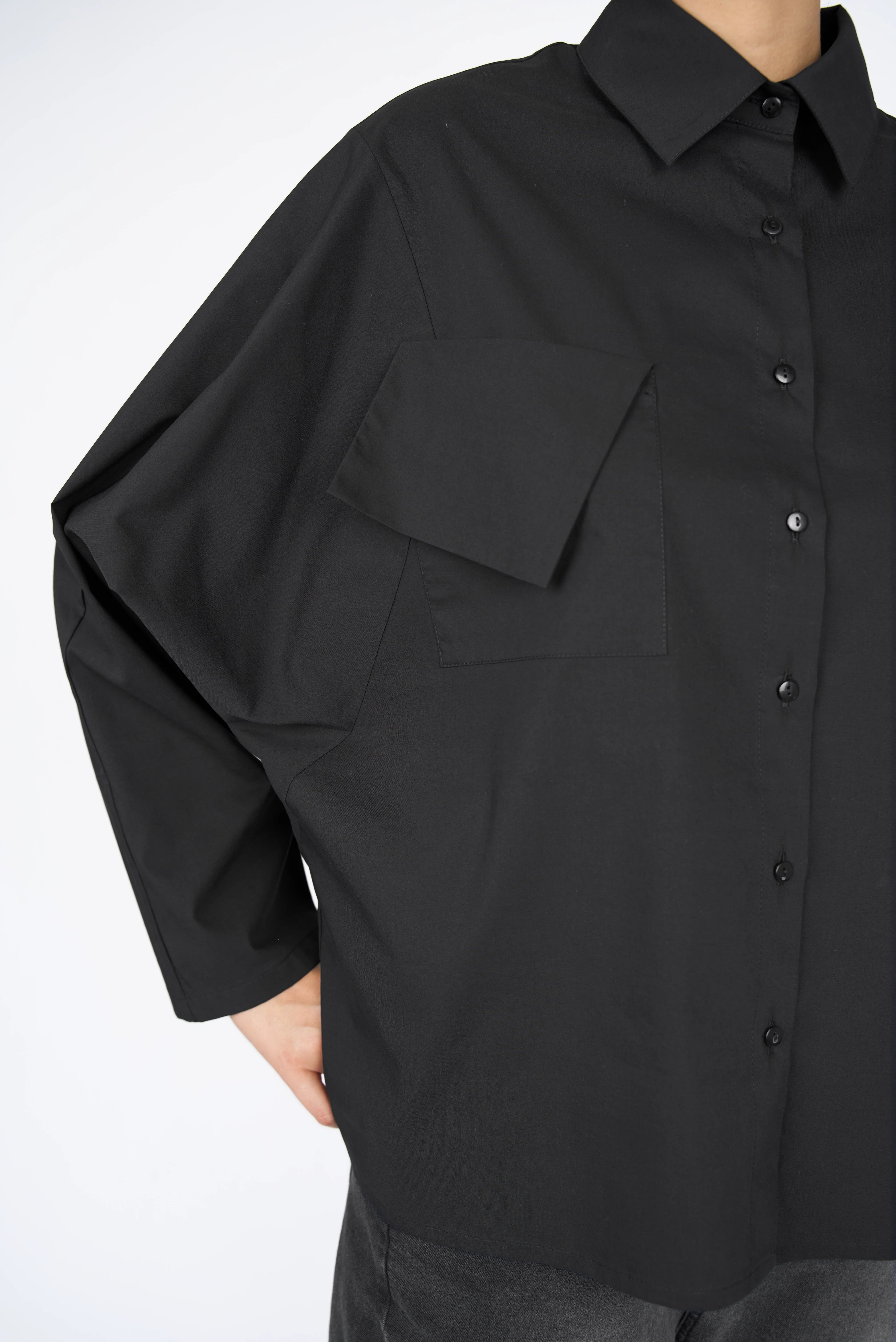 Black MELIZA Bluse popeline blouse with relaxed fit, bat-cut sleeves, and asymmetrical flap pockets