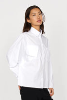 White MELIZIA Bluse aus Popeline shirt with bat-cut sleeves and asymmetrical pockets, relaxed fit and stretch poplin fabric