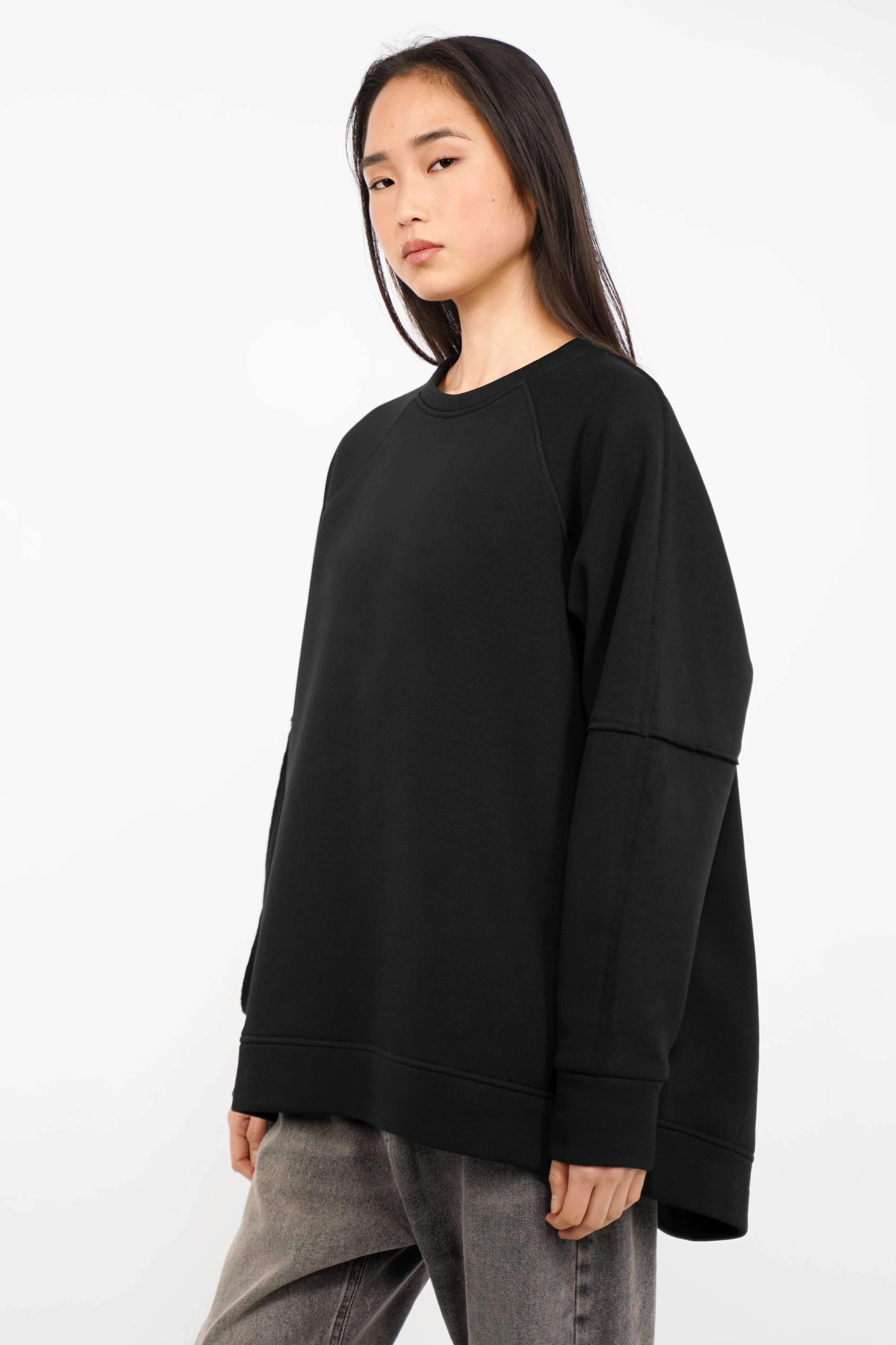 NAIRA Cozy Sweater black soft brushed cotton A-line relaxed fit women’s pullover with rounded hem and raglan sleeves