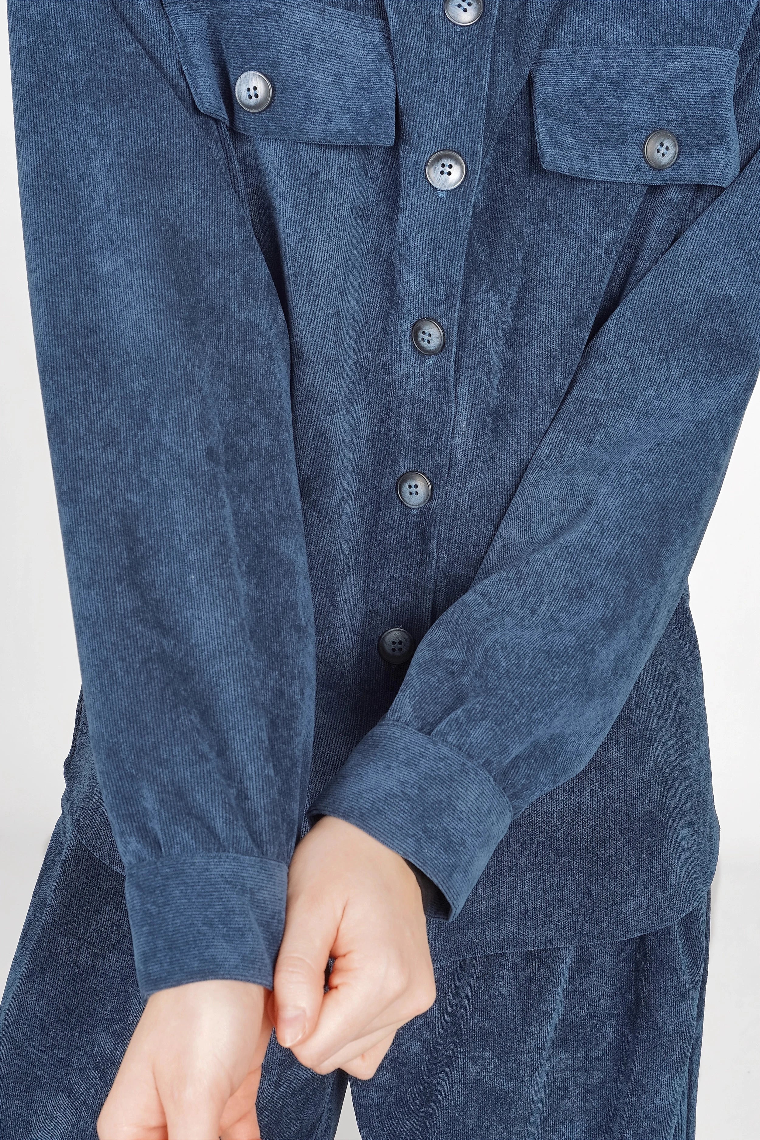 POULA Cord Overshirt in relaxed fit with chest flap pockets and buttoned front in soft blue corduroy fabric
