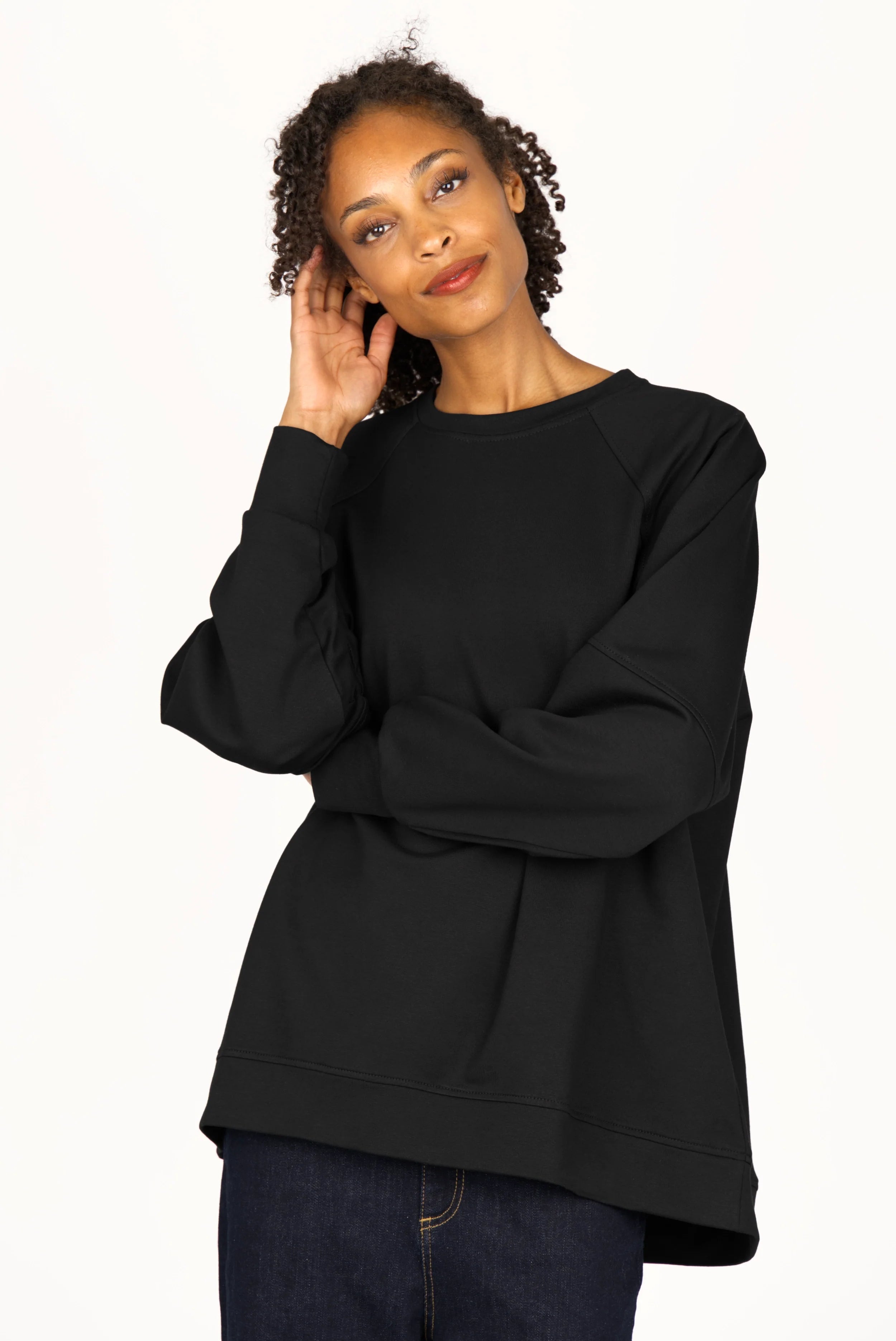 Black SELKA Sweater with A-line relaxed fit, raglan sleeves, and tonal logo embroidery.