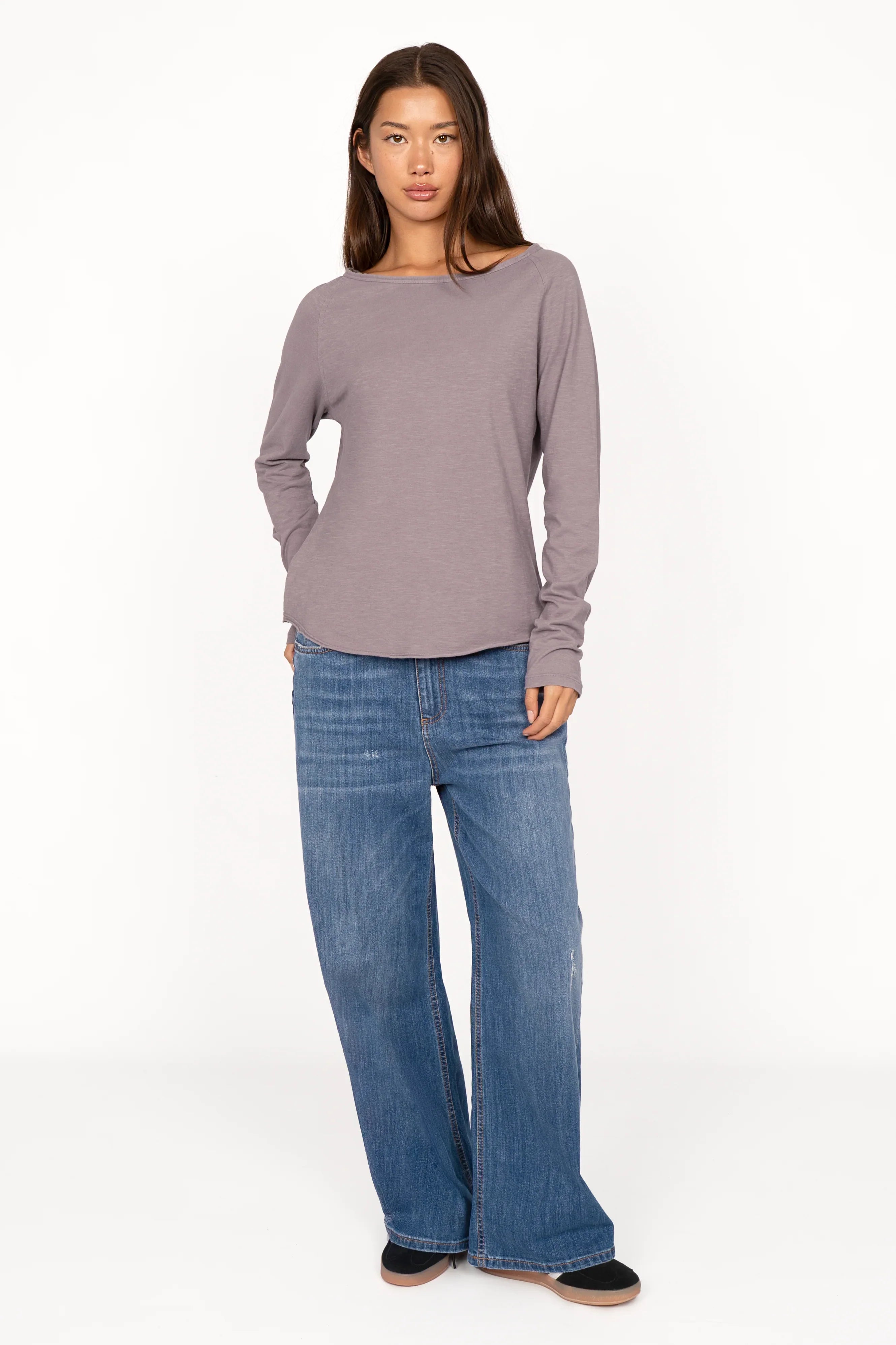 Woman wearing TEHI Longsleeve soft cotton purple top with raglan sleeves and round neckline