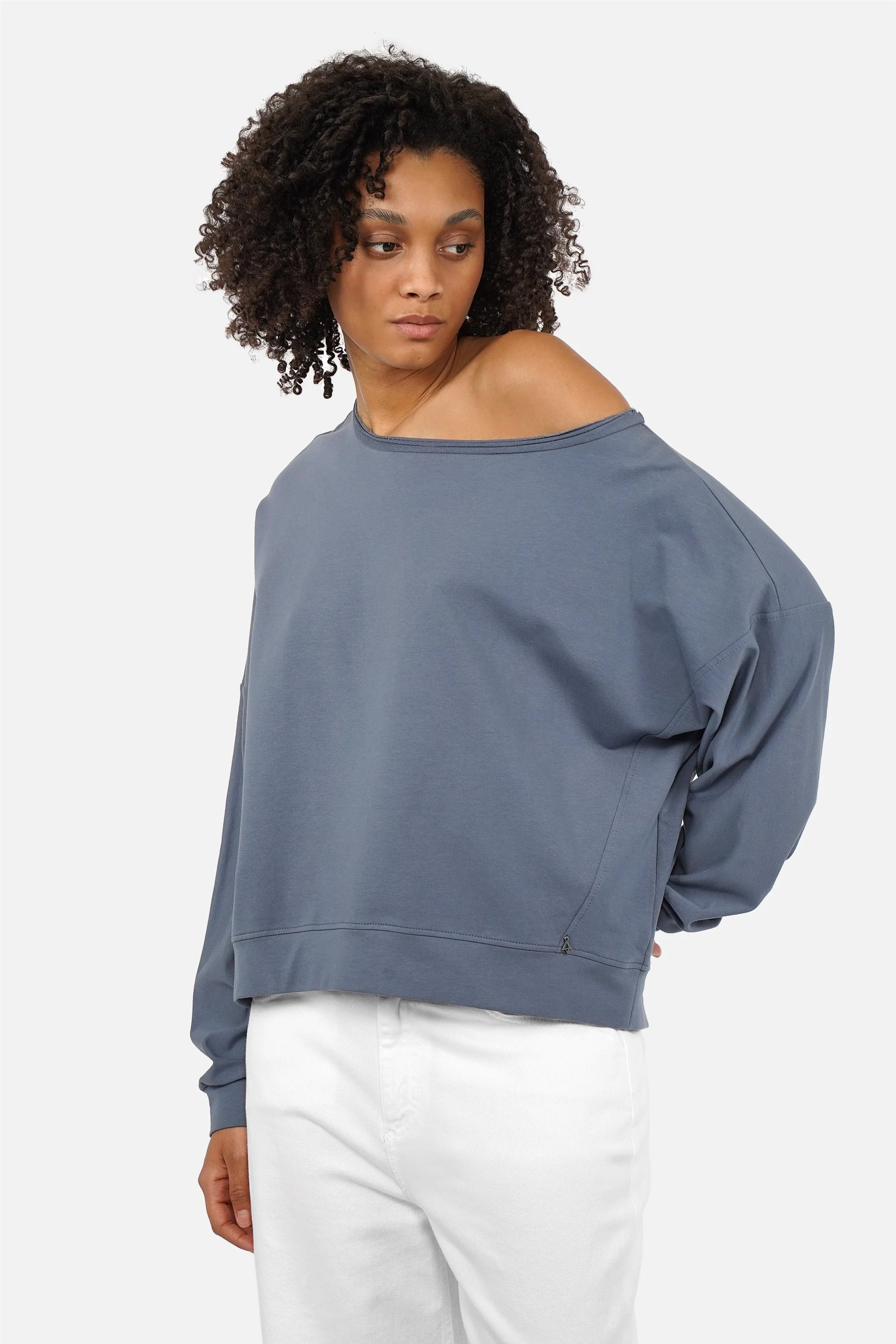 One Shoulder Sweater with wide neckline and soft fabric, loose fit and extended cuffs