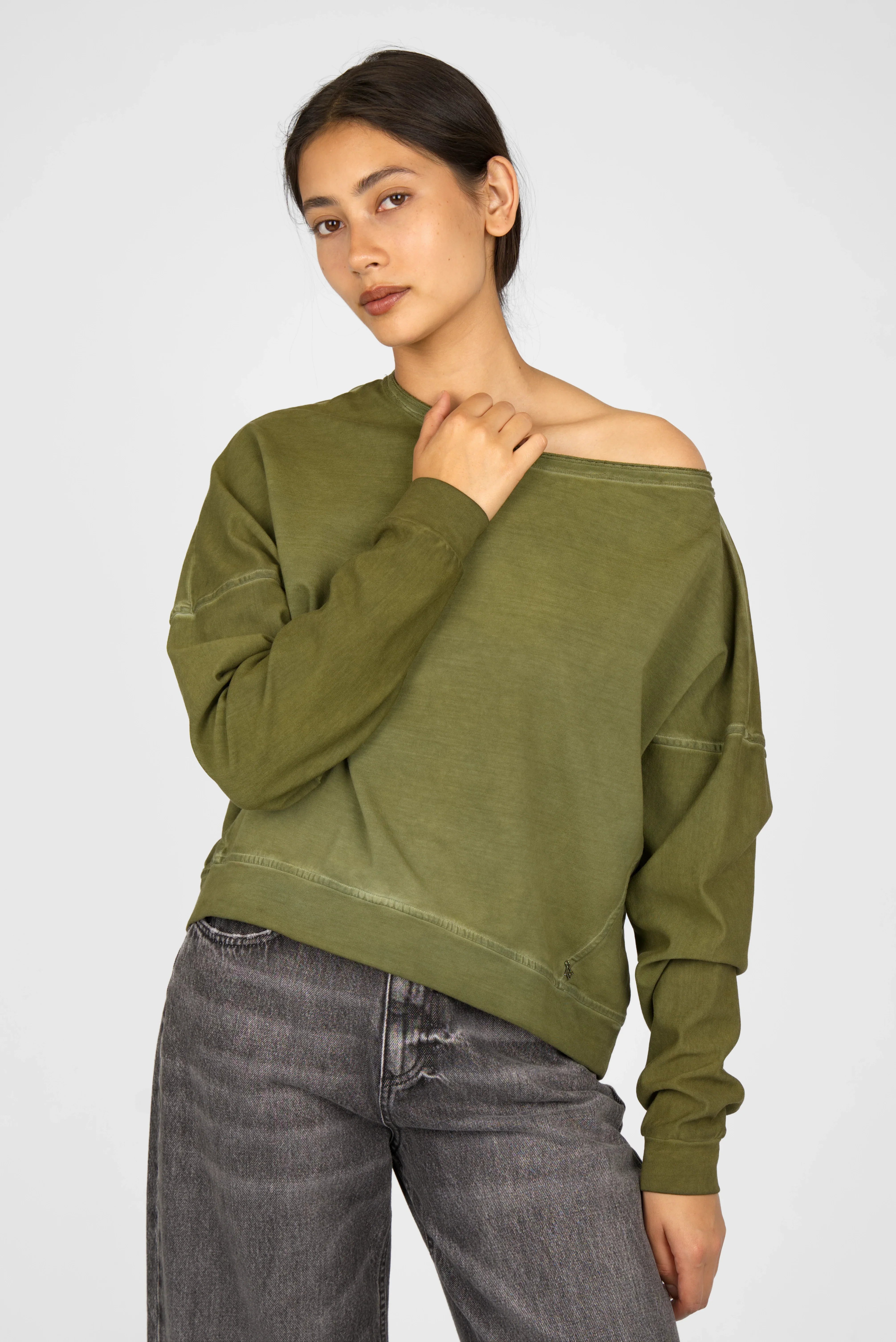 TIMAJ Revive green one shoulder loose fit sweater with vintage wash and raw edge neckline on model
