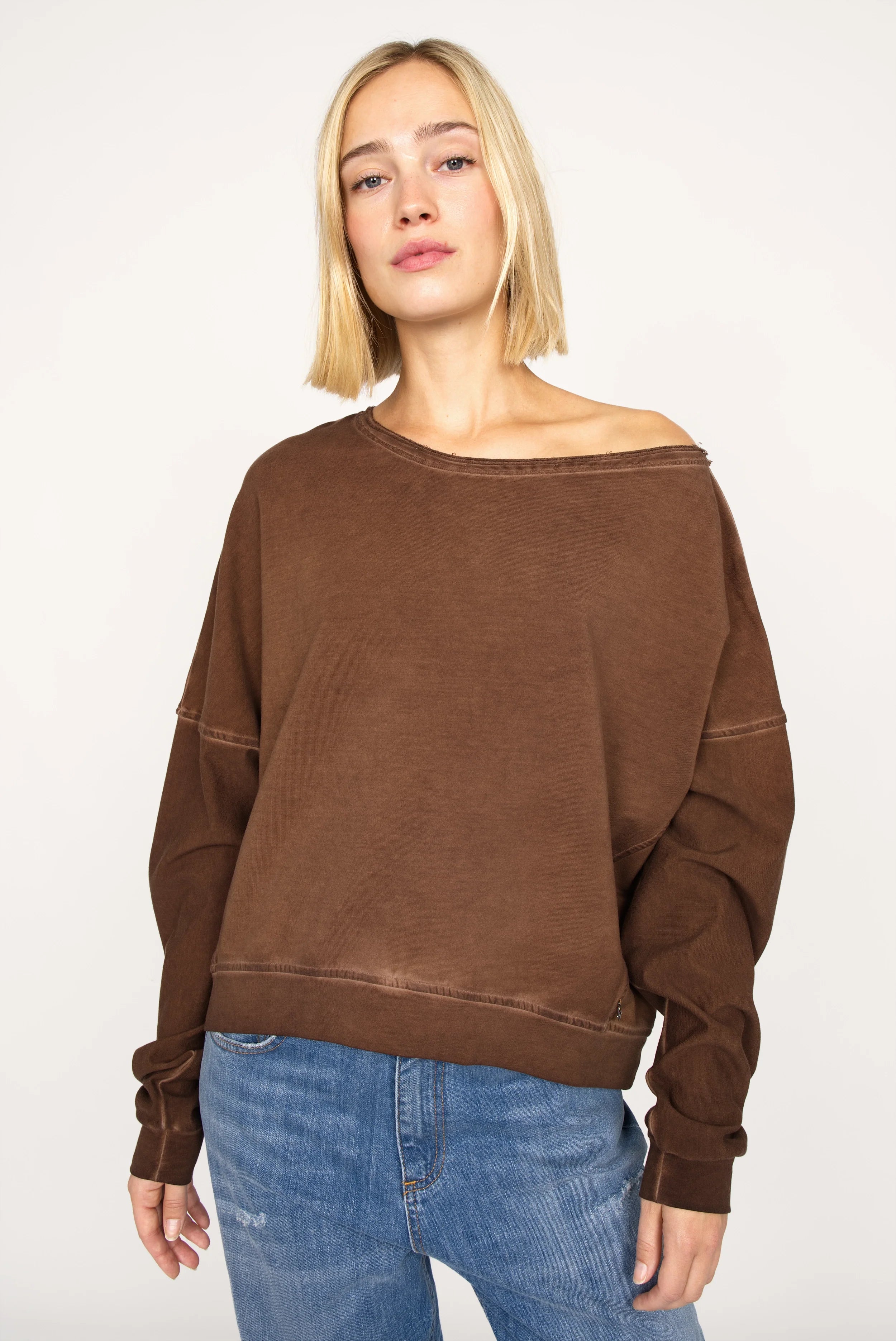 TIMAJ Revive One Shoulder Sweater in mocha with vintage wash, loose fit, off-shoulder neckline, and ribbed cuffs.