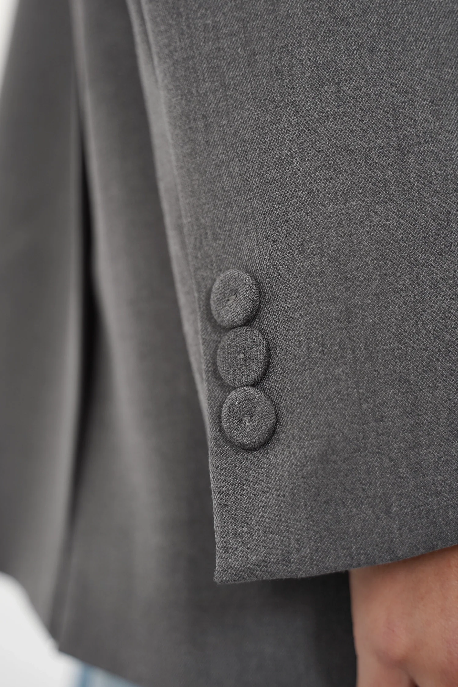 VANYAA oversized blazer with soft fabric, notch lapel, fabric-covered buttons, front welt pockets, back vents, and inner lining.