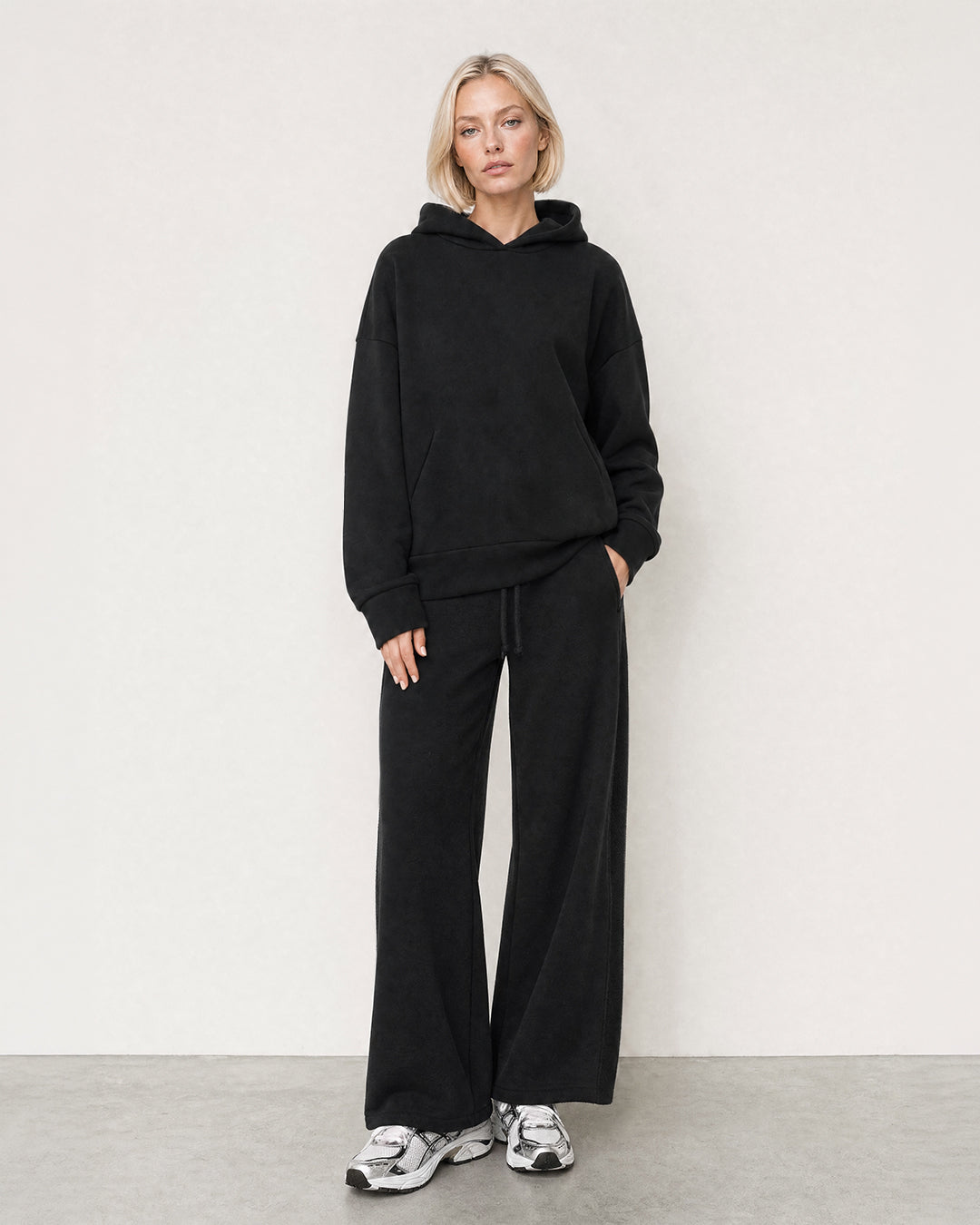 Black LAURA.K oversized hoodie and DESSI sweatpants as a complete look