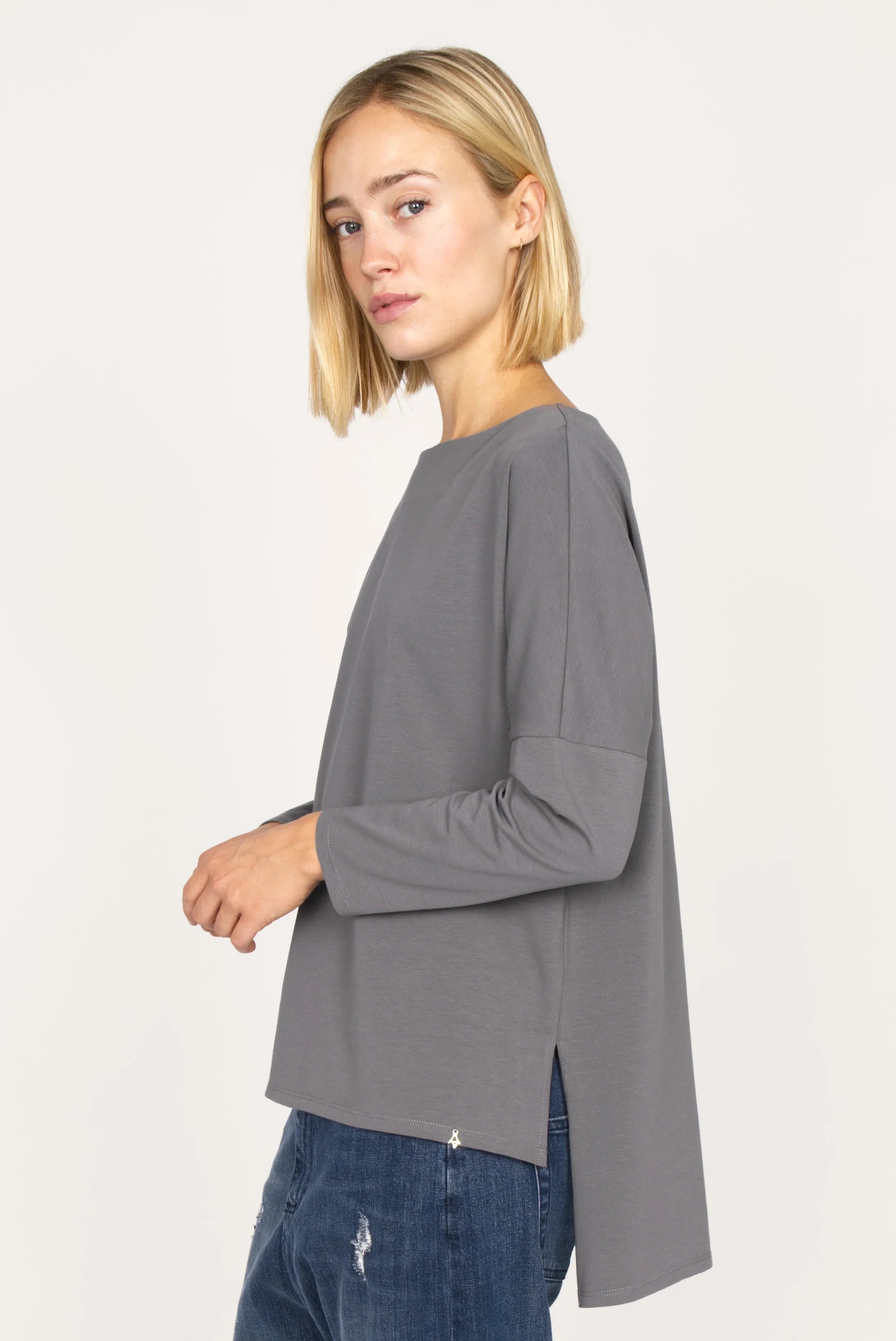 AMALEA Relaxed Fit gray longsleeve with boat neckline, dropped shoulders, side slits, and extended back hem.