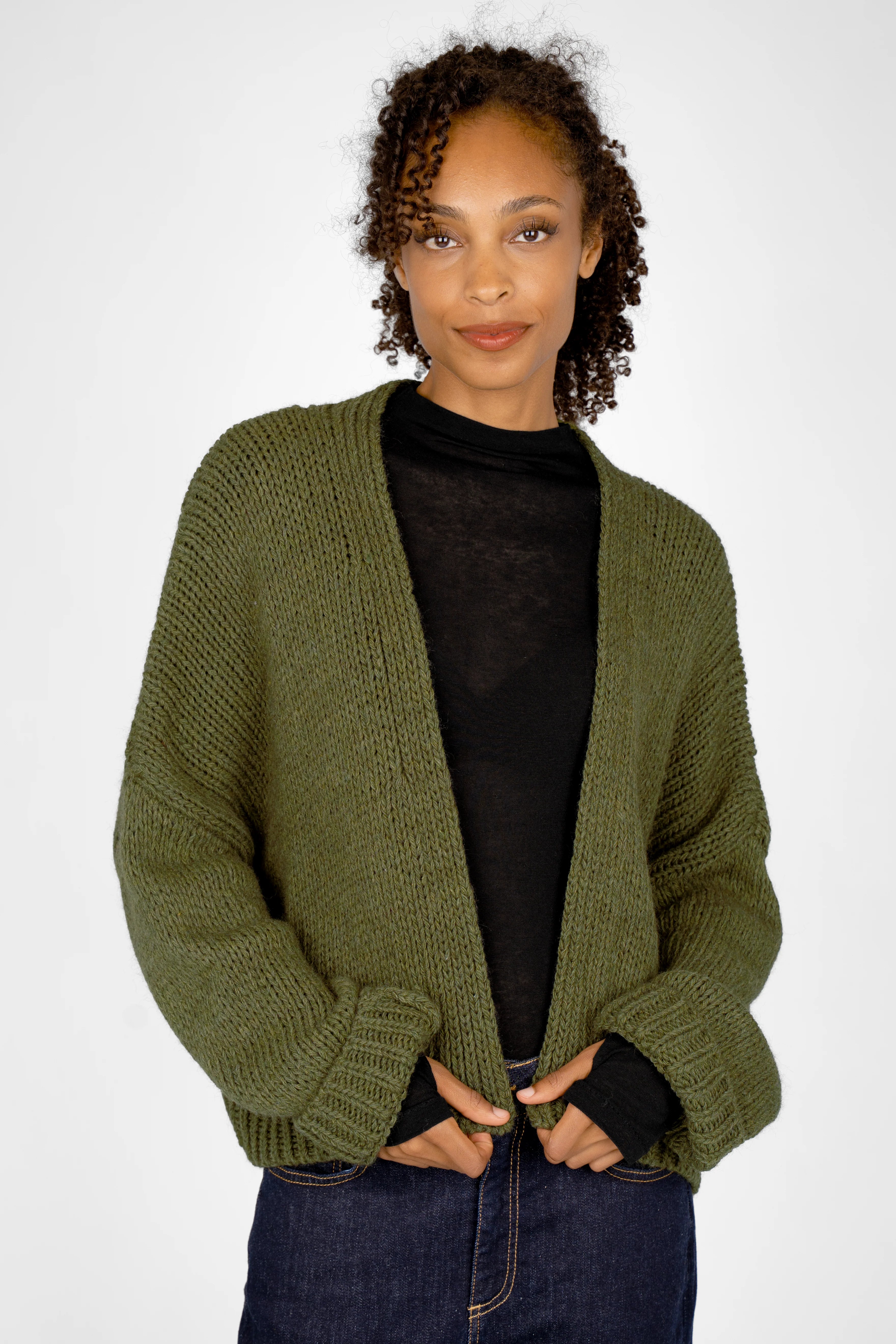 ALIXA Cropped Strickcardigan olive green knit cardigan with shawl collar and oversized fit on model