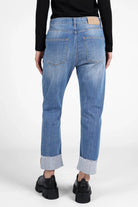 ALVA Boyfriend-Jeans with raw-cut cuff, mid waist, relaxed fit, and destroyed details in light blue denim from the back view