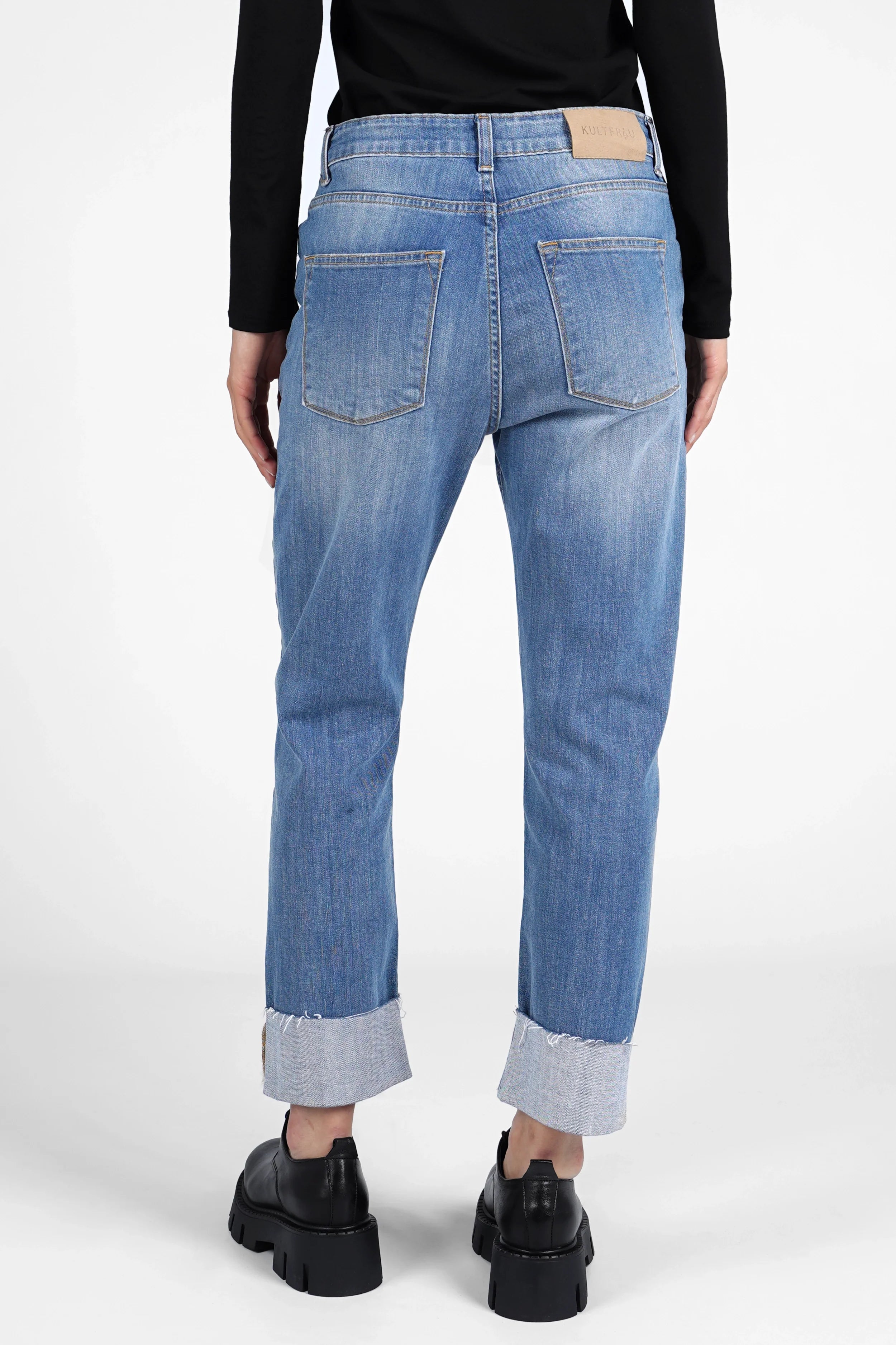 ALVA Boyfriend-Jeans with raw-cut cuff, mid waist, relaxed fit, and destroyed details in light blue denim from the back view