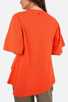 ANELE T-Shirt soft cotton jersey round neckline flared sleeves longer back A-line shape regular fit size S worn by model 1.77m tall