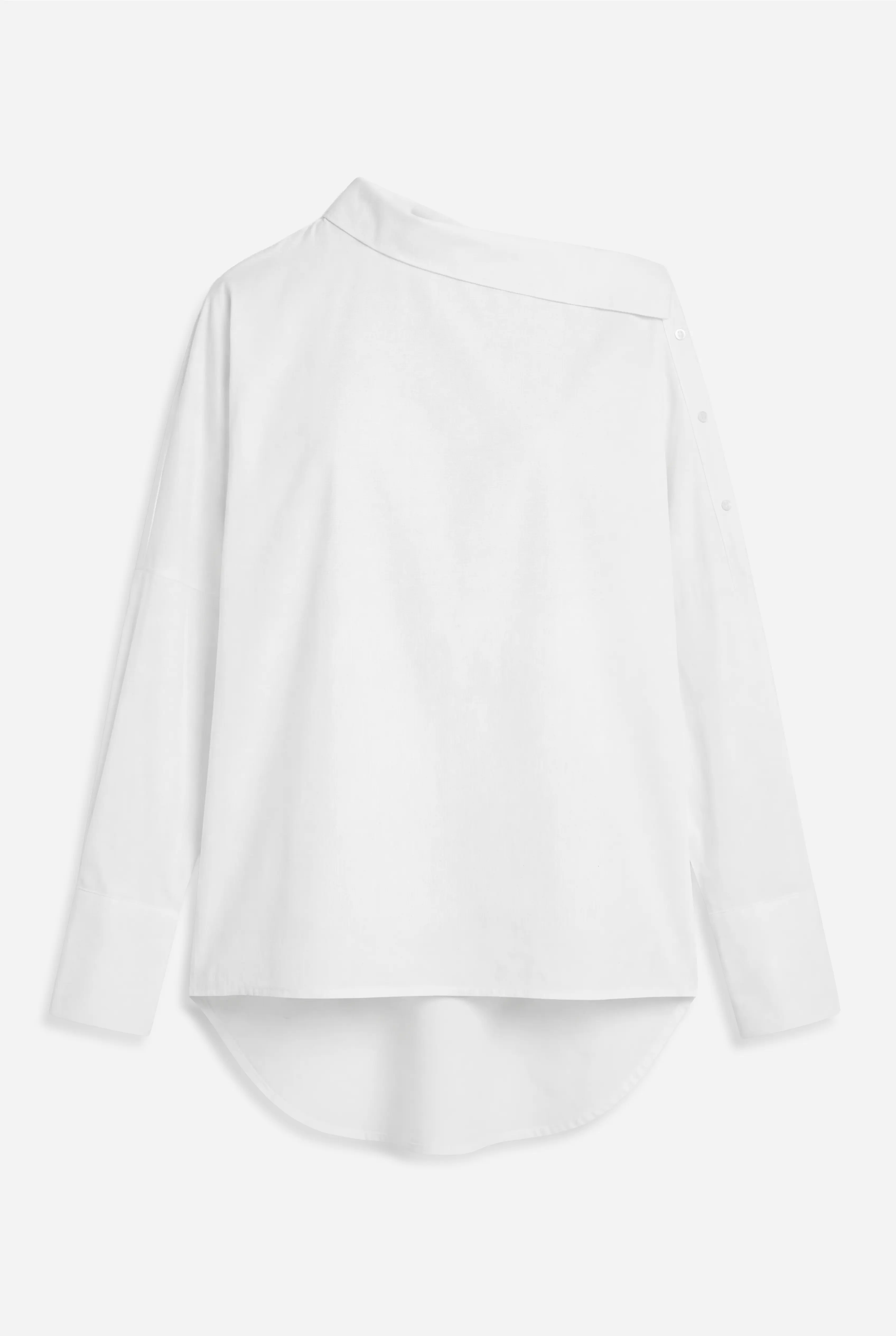 BONI asymmetrische One Shoulder Bluse mit verlängertem Rücken und breiten Manschetten