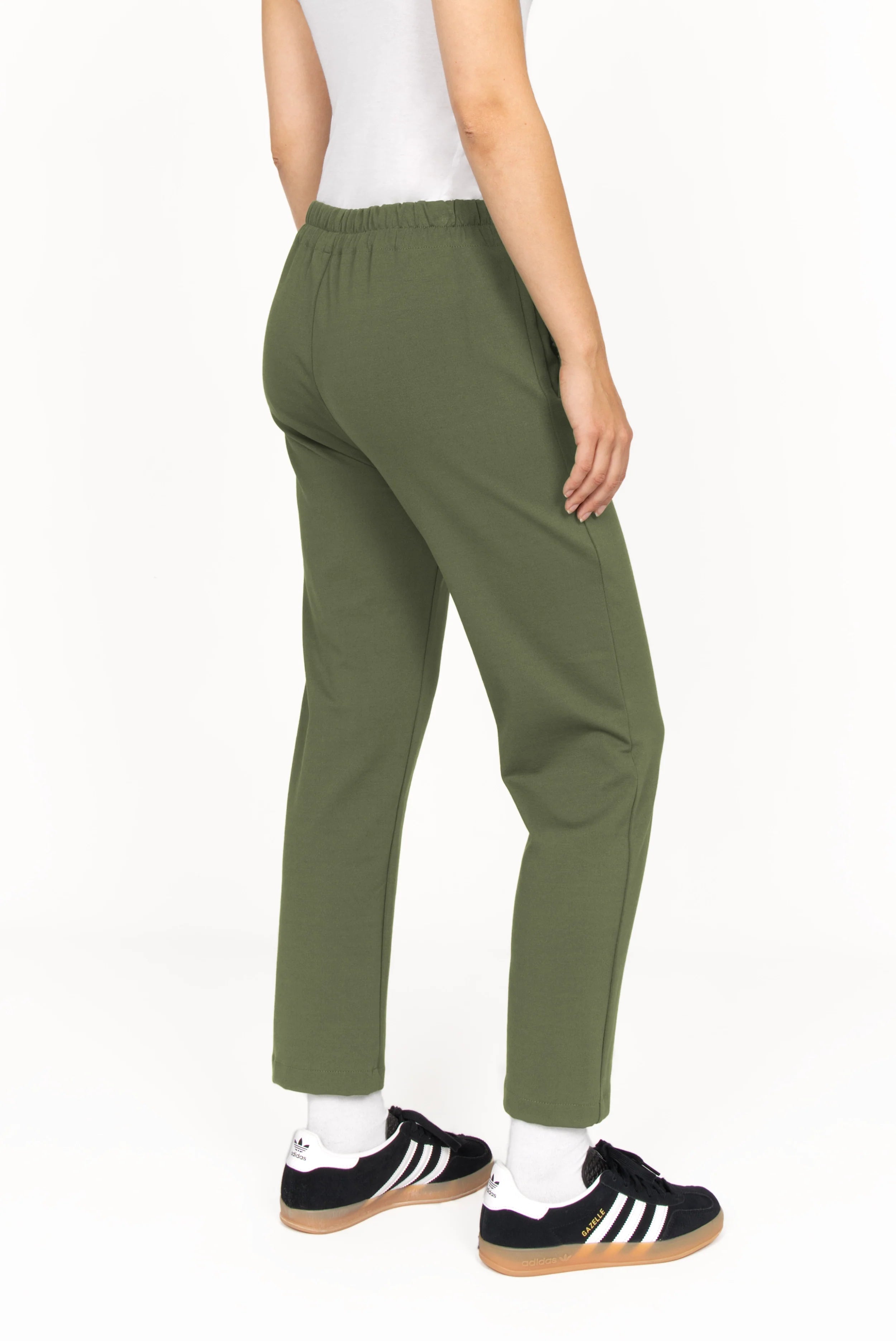 Women's olive green slim fit ankle pants with elastic back waistband and side pockets