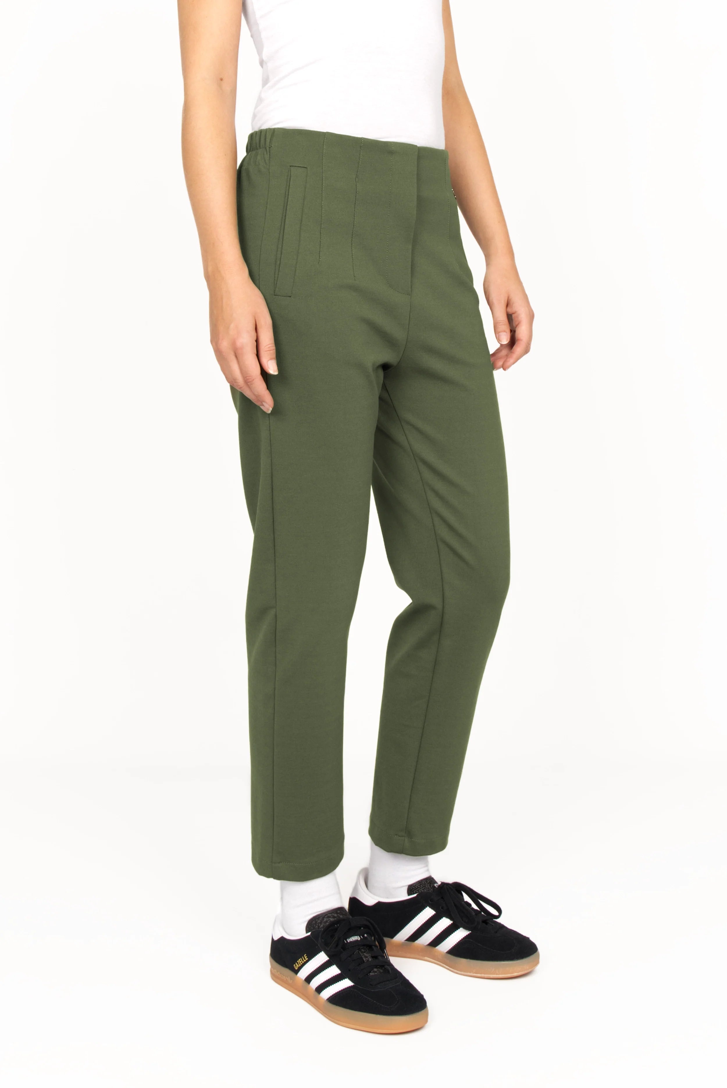 Slim fit CEELIA ankle pants in olive green with high waist, elastic back waistband, decorative seams, and side pockets.