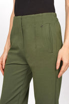 Green CEELIA ankle pants with slim fit, high waist, and side pockets.