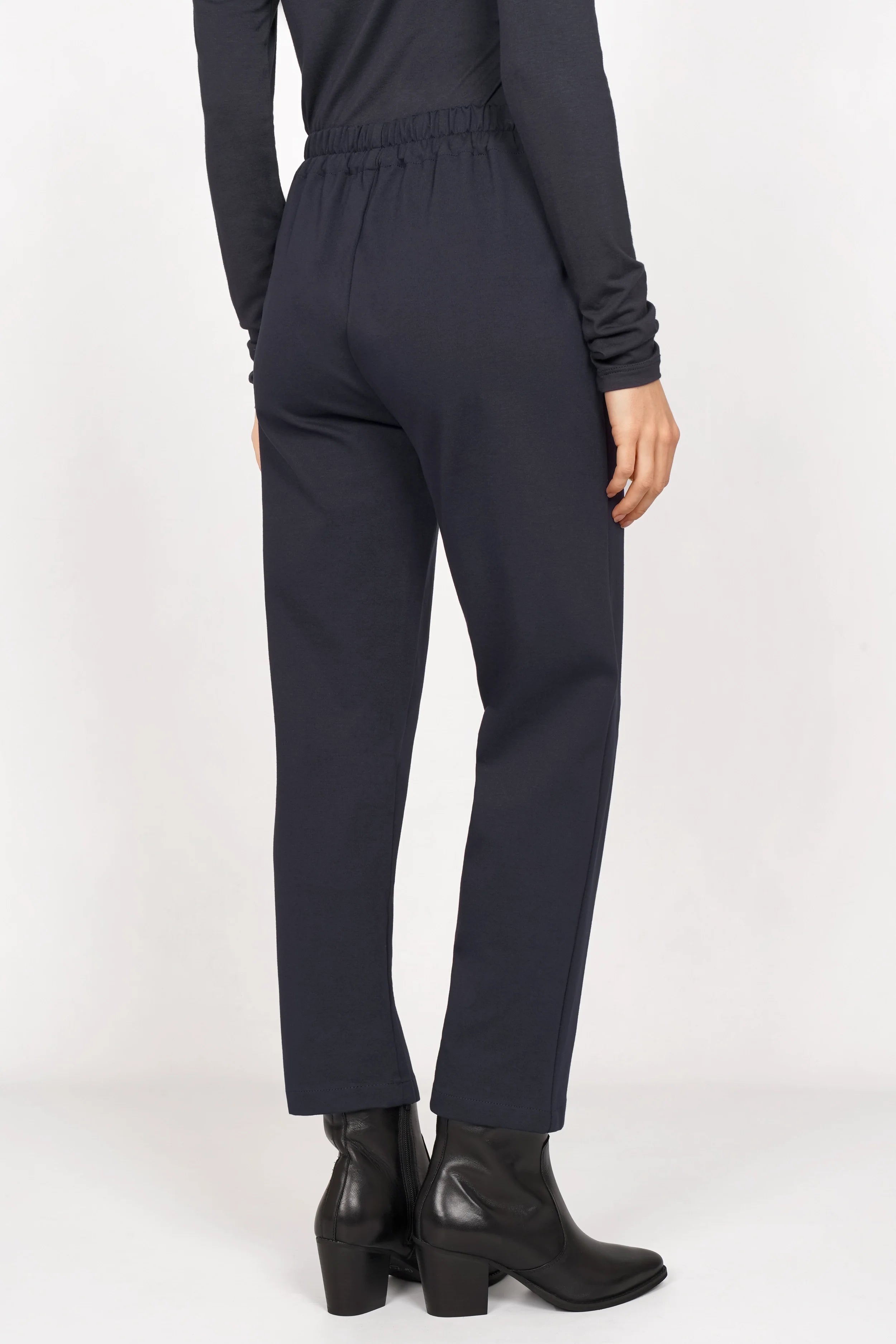 CEELIA Ankle Pants in black with elastic back waistband, cropped slim fit, and side pockets.