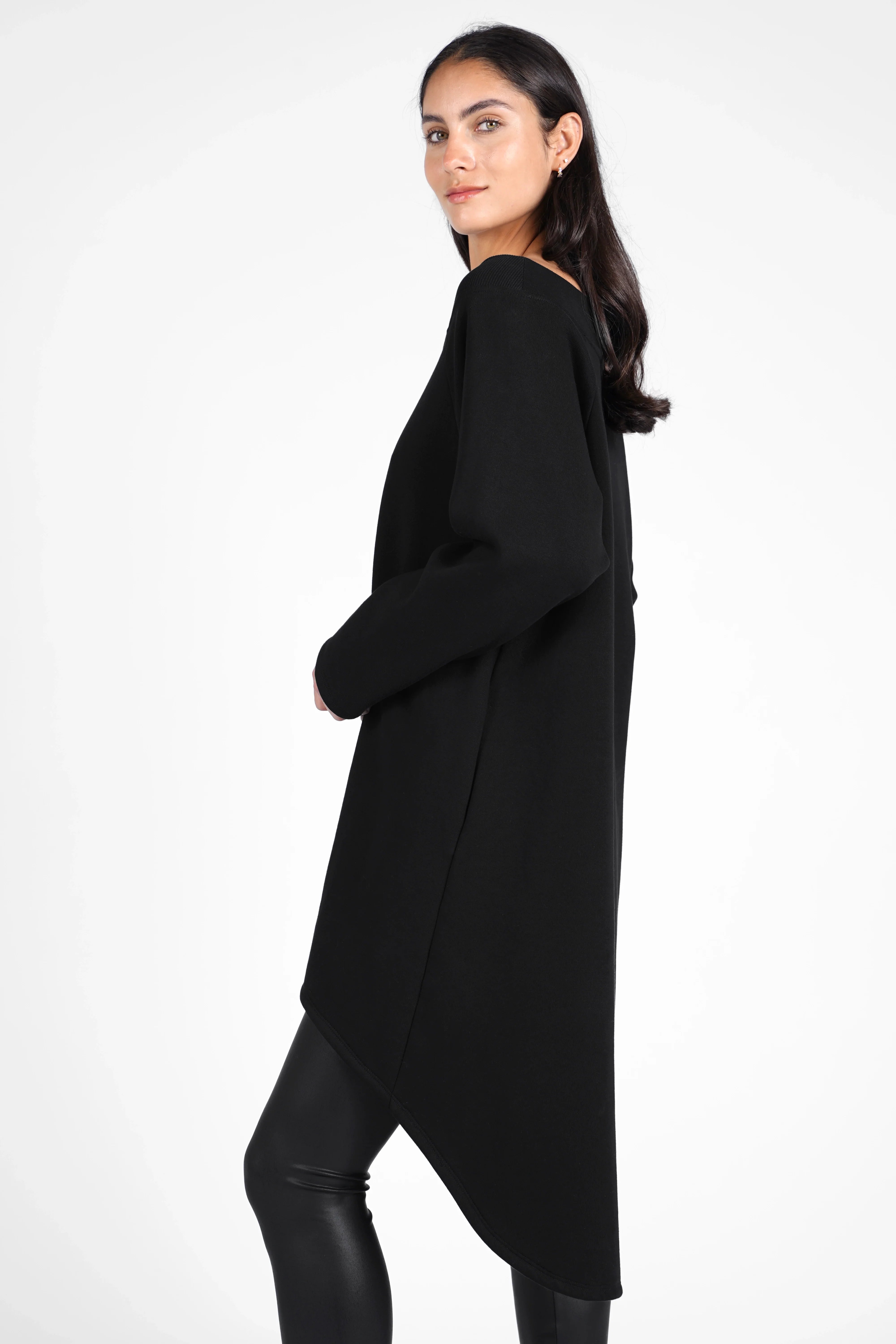 Woman wearing black CHERIN super-longsweater with U-boat neckline and relaxed fit