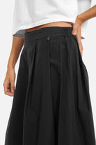 DAEUN Hosenrock wide-leg cropped pants with soft poplin fabric, elastic back waistband, front smooth band, pleats, and relaxed fit.