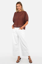 LIAME Wide Leg Jeans mid waist blue coloured denim relaxed fit with raw-cut cuff and destroyed look