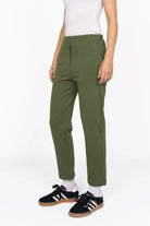 Slim fit green CEELIA ankle pants with high waist and elastic back waistband, made from structured jersey fabric.