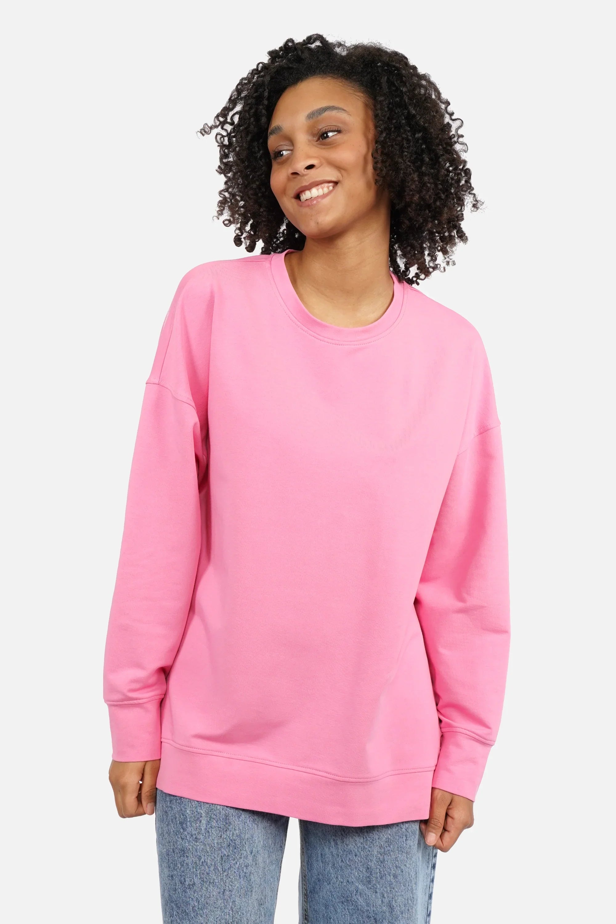 EIREL oversize sweater with soft cotton, round neckline, dropped shoulders, ribbed cuffs, rounded hem, tonal logo embroidery, A-line silhouette, and oversize fit.