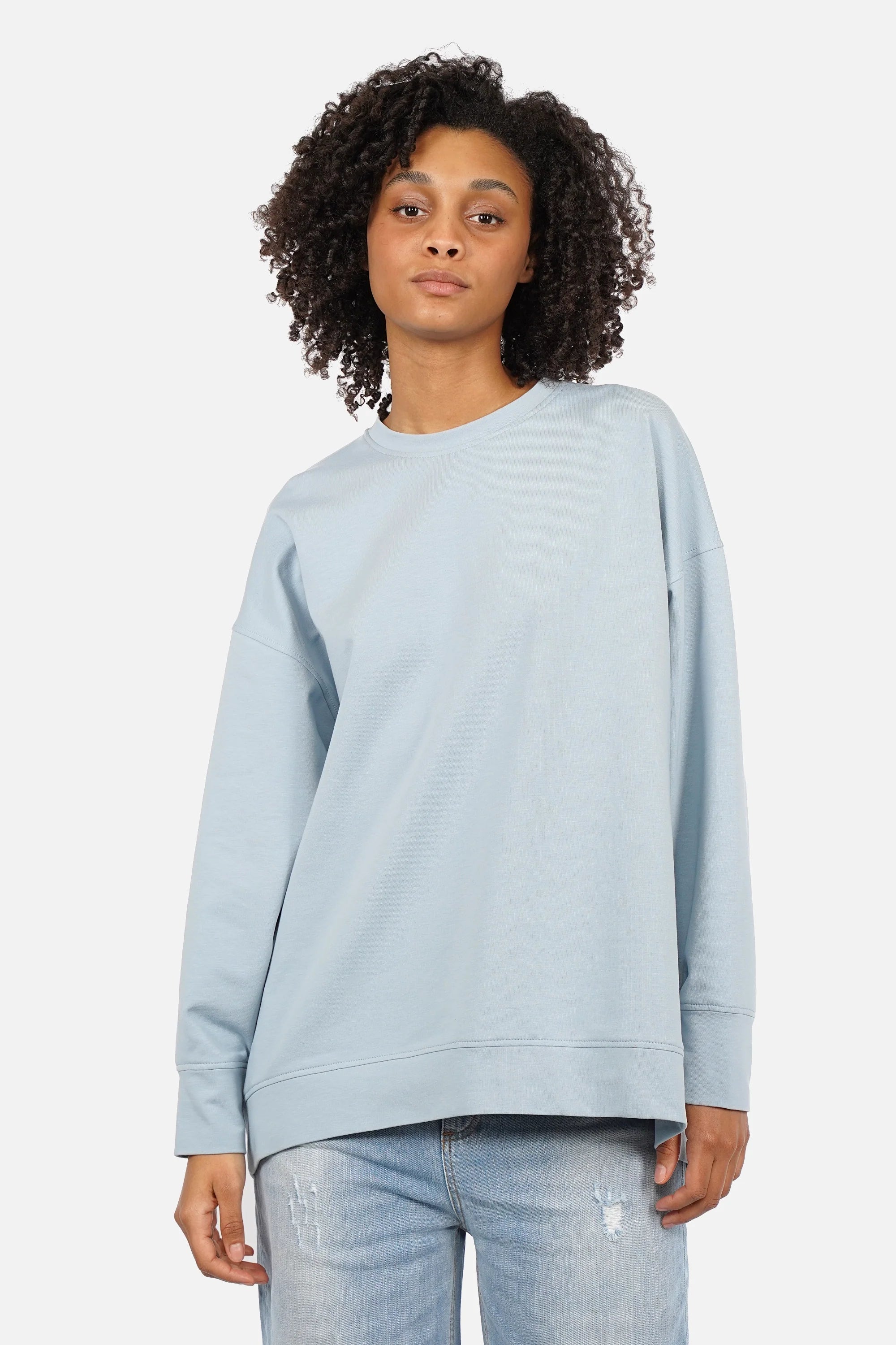 EIREL Oversize Sweater in soft cotton with round neckline, dropped shoulders, ribbed cuffs, rounded hem, tonal logo embroidery, A-line fit, and oversized silhouette.