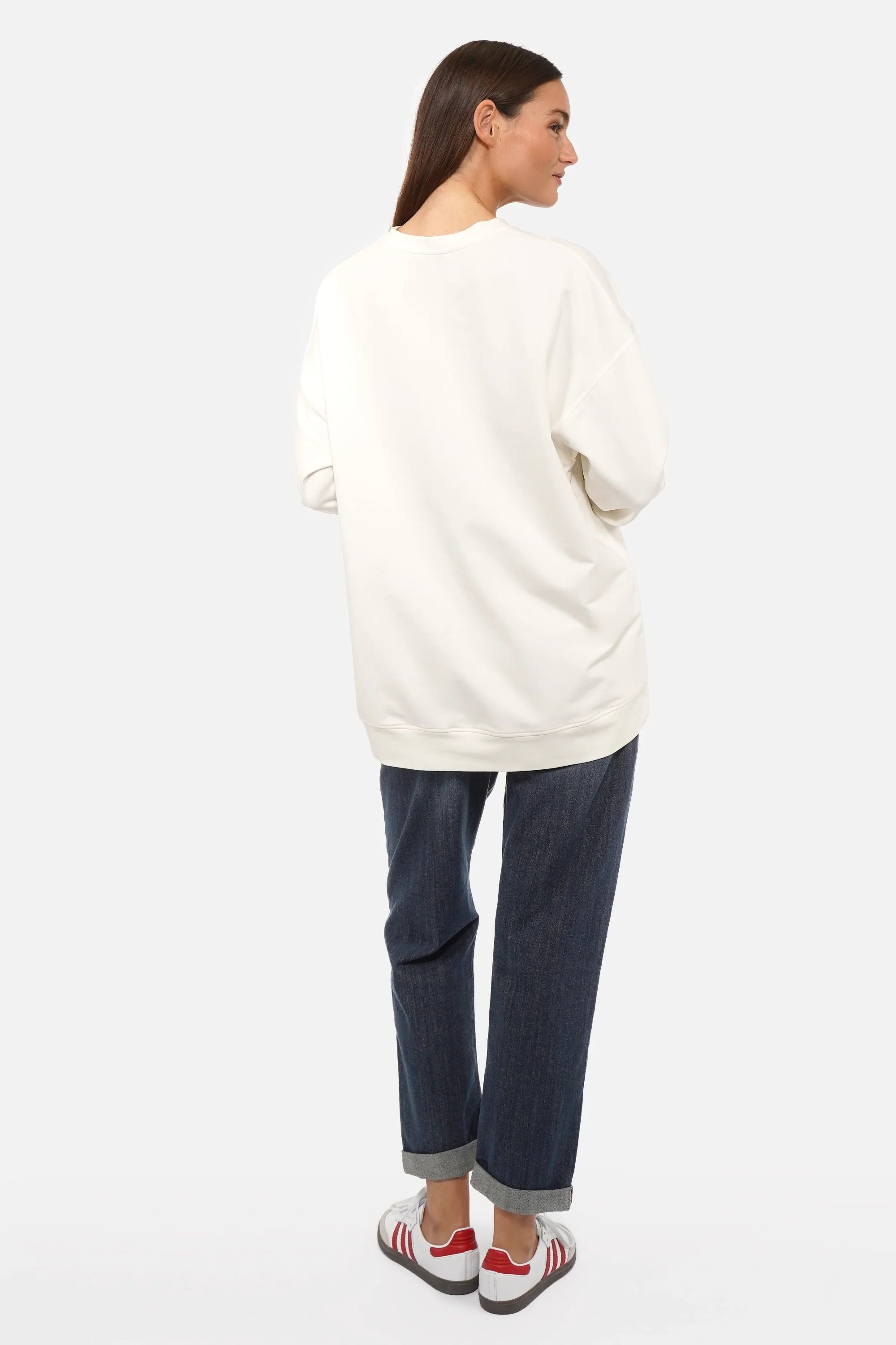 EIREL oversize sweater with soft cotton, round neckline, dropped shoulders, ribbed cuffs, rounded hem, tonal logo embroidery, A-line shape, and oversize fit.