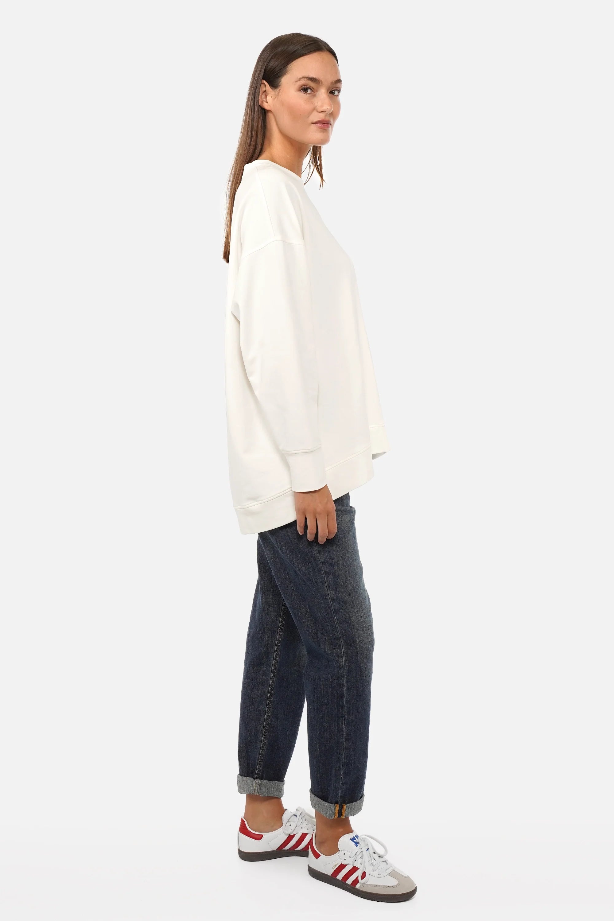 EIREL oversize sweater with soft cotton fabric, round neckline, dropped shoulders, ribbed cuffs, rounded hem, tonal logo embroidery, A-line shape, and oversize fit.