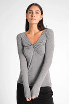 FLURRI Longsleeve gray slim fit top with V-neck twist detail in soft cashmere blend