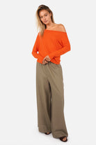 FRYA One Shoulder Longsleeve blouse with asymmetrical neckline and batwing sleeves in lightweight viscose, worn by model size S