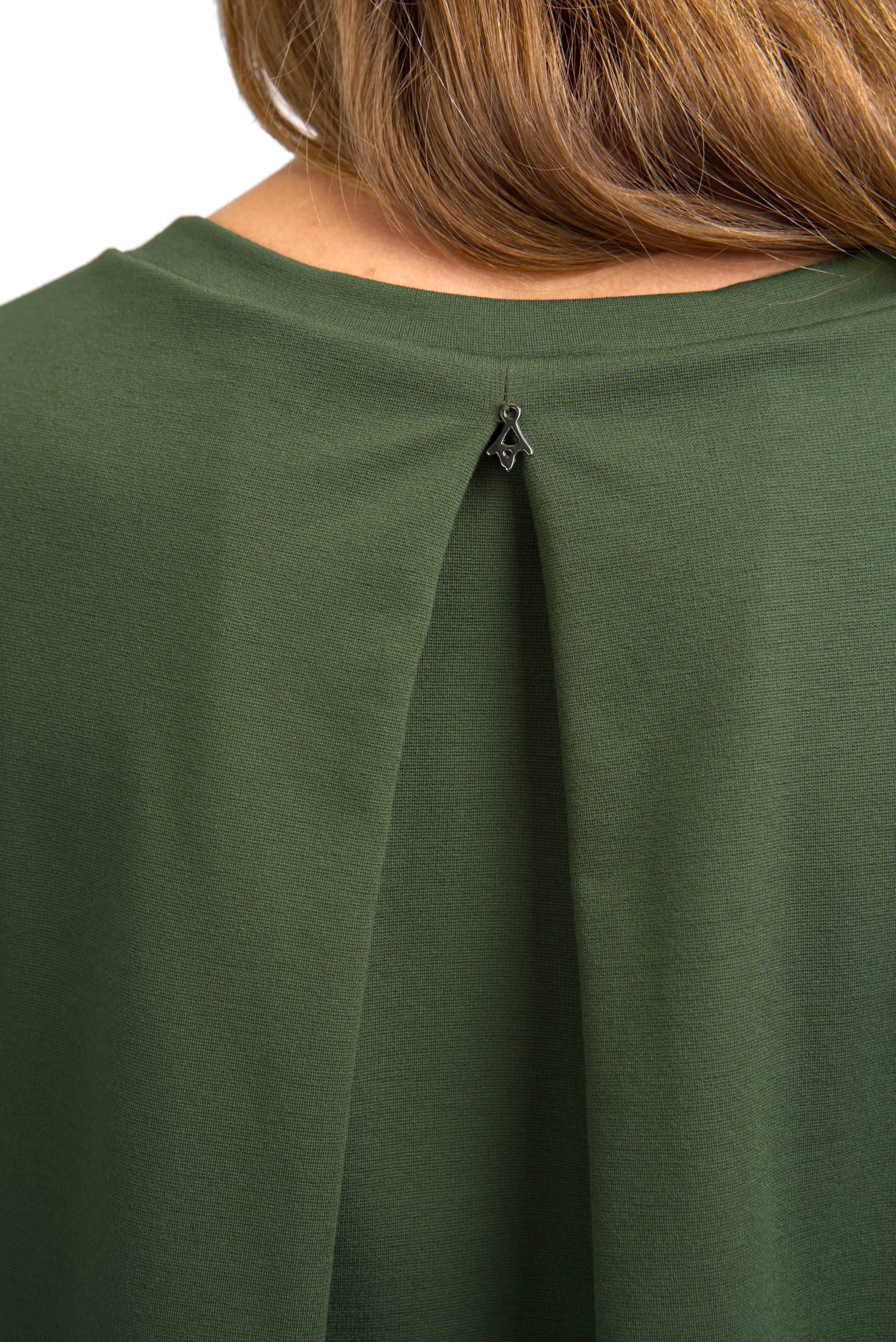 Back detail of olive green HAGLA Shirt with pleat and elastic neckline on model
