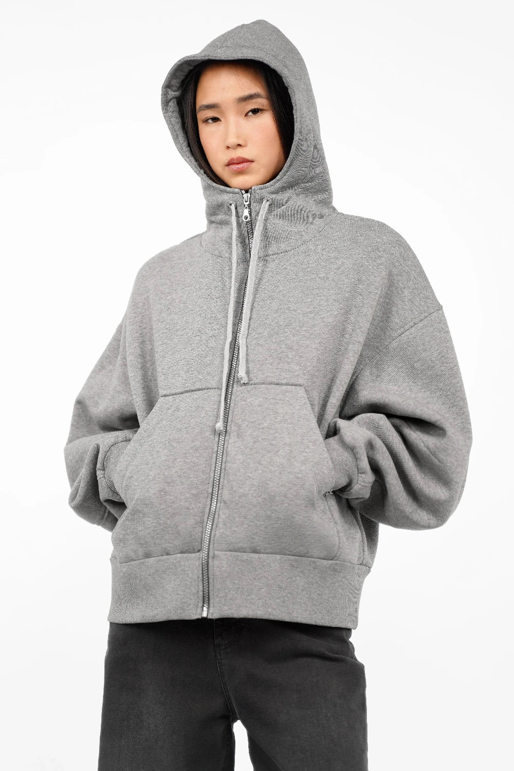 Gray relaxed fit zip-hoodie with hood, kangaroo pocket, and ribbed cuffs