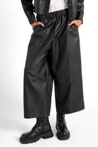 Black HERA Wide Leg Hose in soft eco-leather with elastic waistband and side pockets
