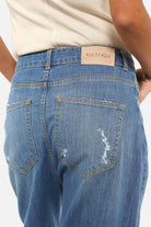 Lightweight Italian denim baggy jeans with destroyed wash and relaxed fit