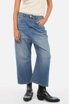 Lightweight Italian denim baggy jeans with relaxed fit and destroyed wash effects