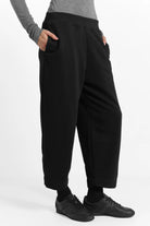 Black JOUDY Carrot Jogpant with elastic waistband and side pockets, cropped length, cotton sweat fabric with brushed interior for soft comfort.