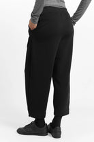 Black JOUDY Carrot Jogpant with cropped length and elastic waistband, cotton sweat material with brushed interior.